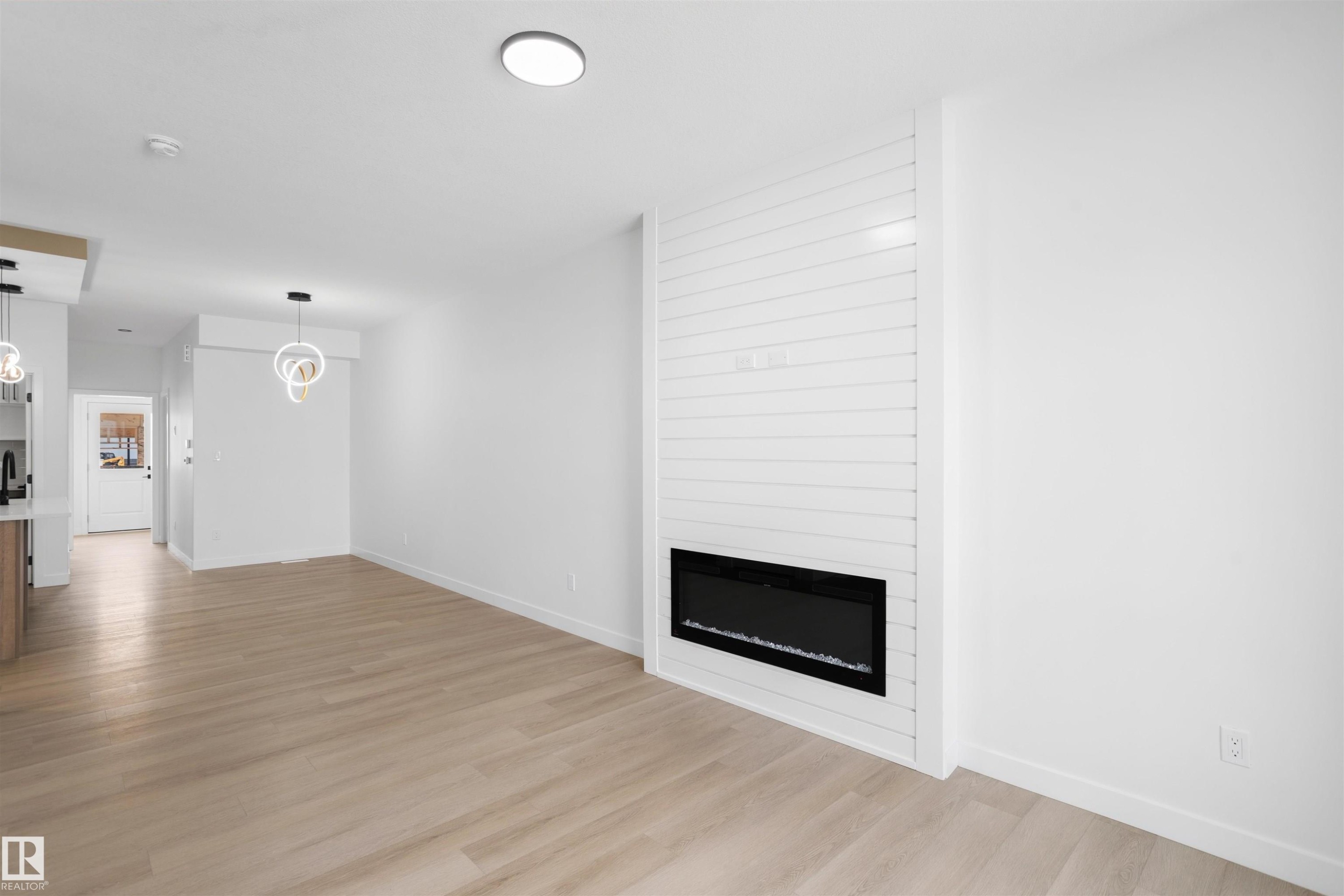 1563 211 Street Nw, Edmonton, AB - Indoor Photo Showing Living Room With Fireplace
