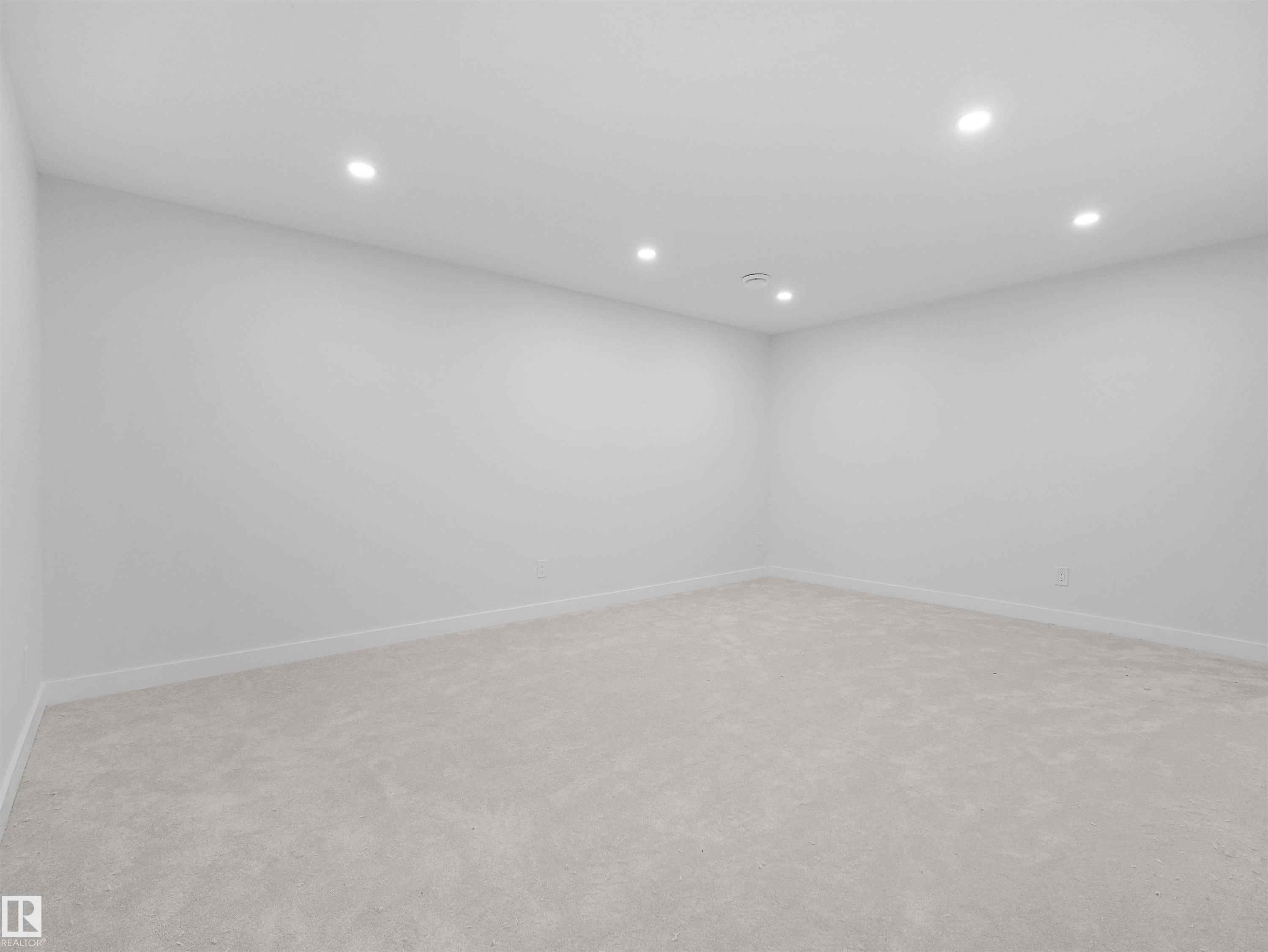 Recessed lighting, light gray carpet, and white walls - 126 Woodstock Nw, Edmonton, AB - Indoor