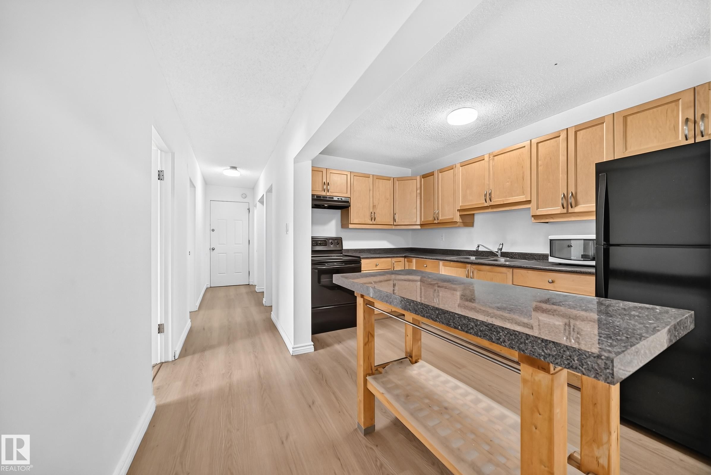 #10 6120 118 Av Nw, Edmonton, AB - Indoor Photo Showing Kitchen With Double Sink