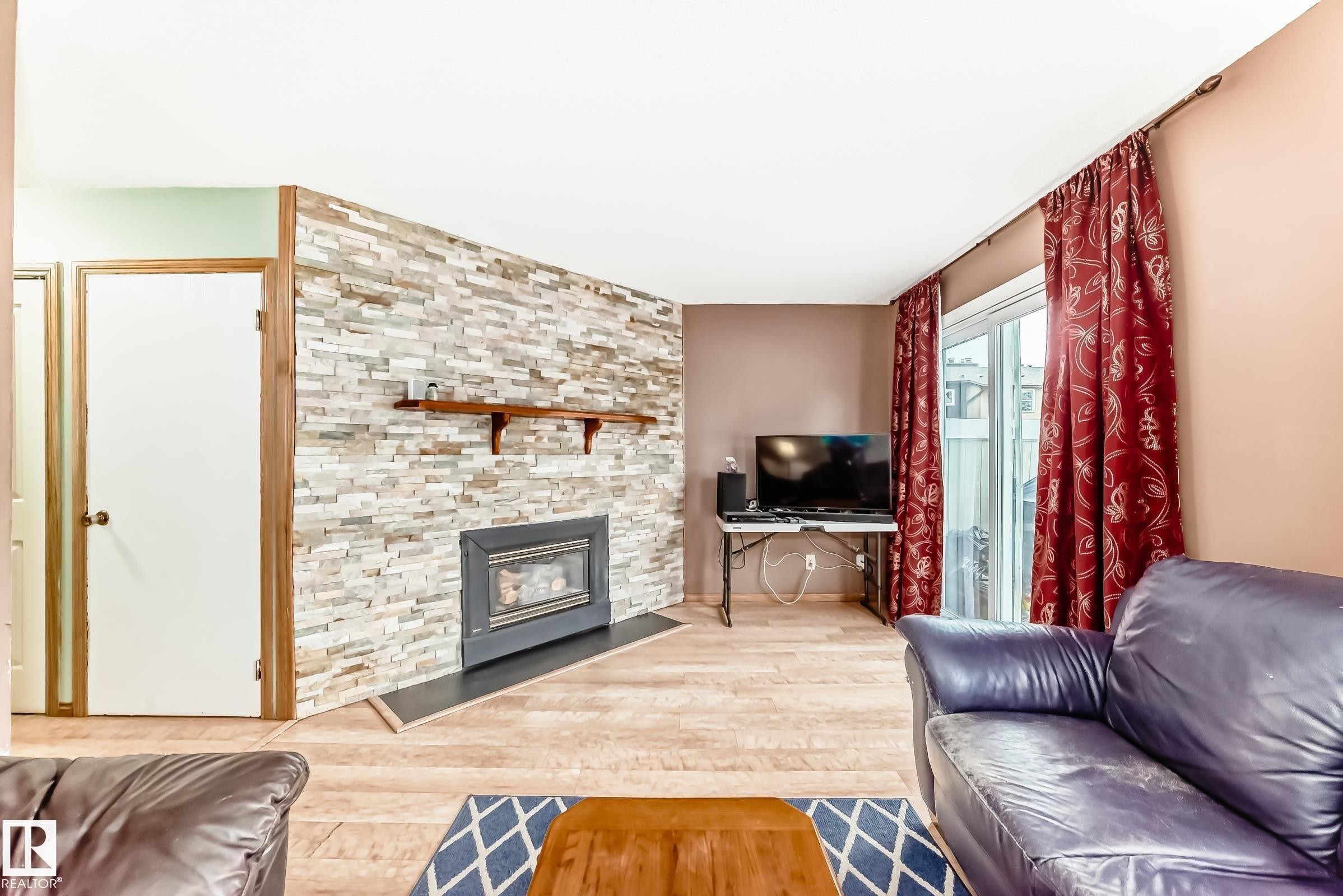 3151 139 Avenue Nw, Edmonton, AB - Indoor Photo Showing Living Room With Fireplace