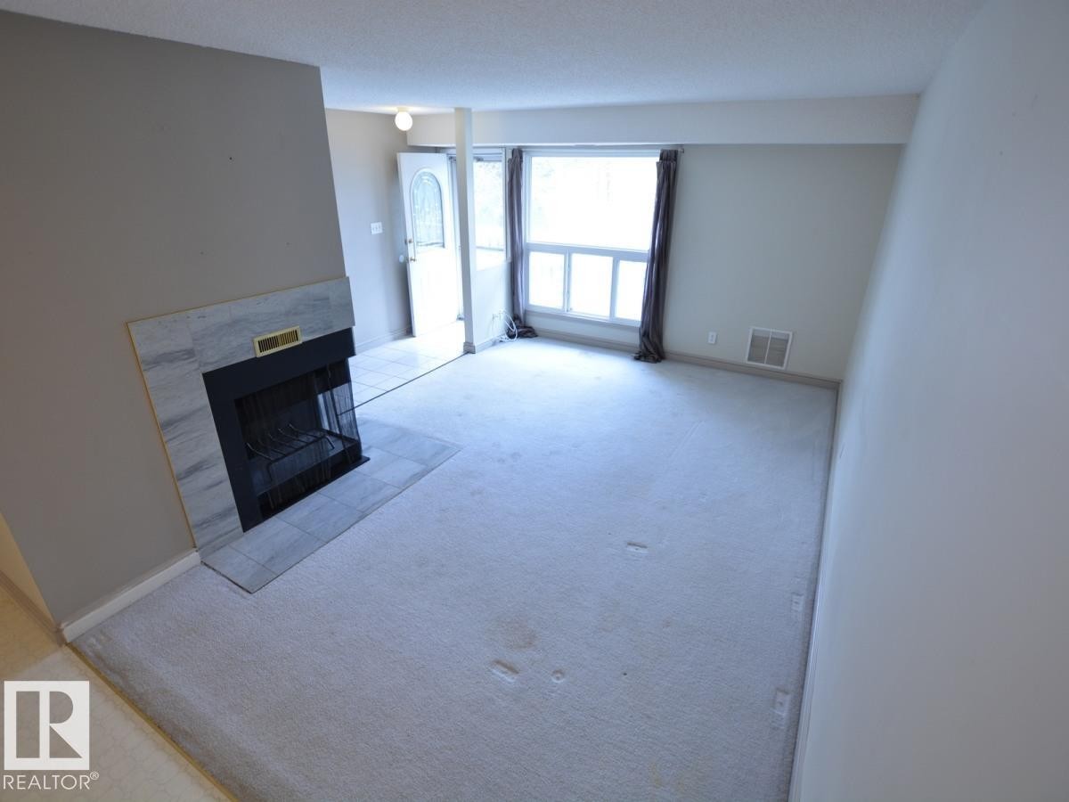 #10 2703 79 St Nw, Edmonton, AB - Indoor With Fireplace
