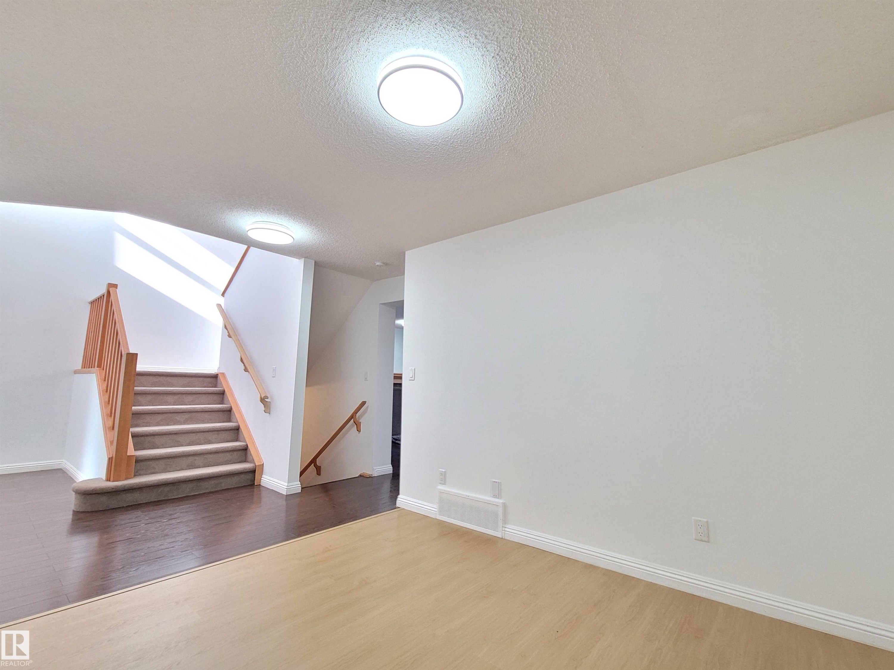 2562 Hanna Crescent Nw, Edmonton, AB - Indoor Photo Showing Living Room With Fireplace