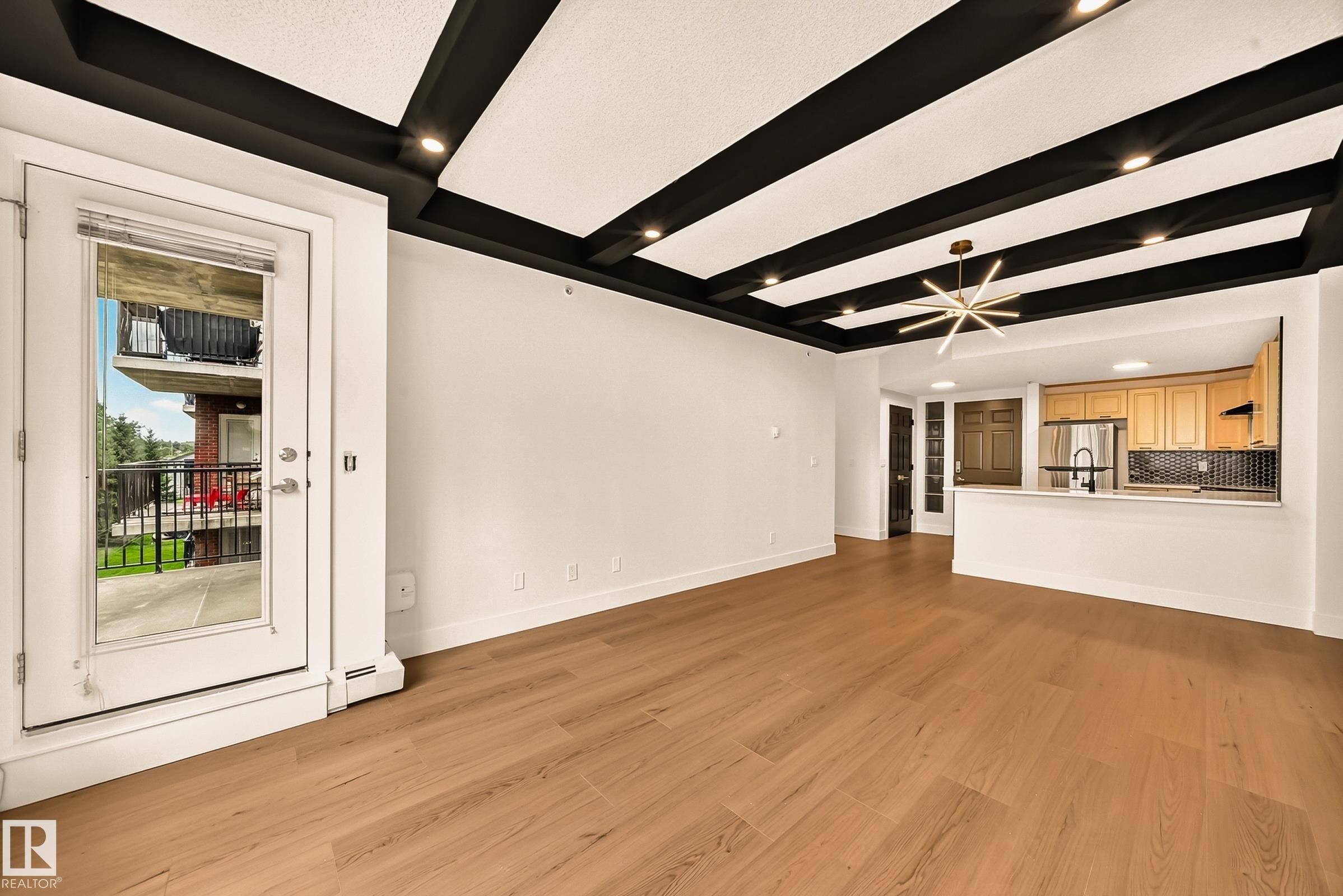 #323 6315 135 Av Nw, Edmonton, AB - Indoor Photo Showing Other Room