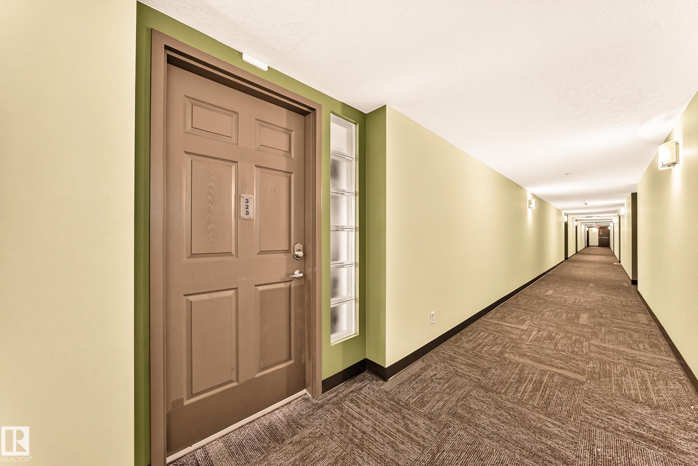 #323 6315 135 Av Nw, Edmonton, AB - Indoor Photo Showing Other Room