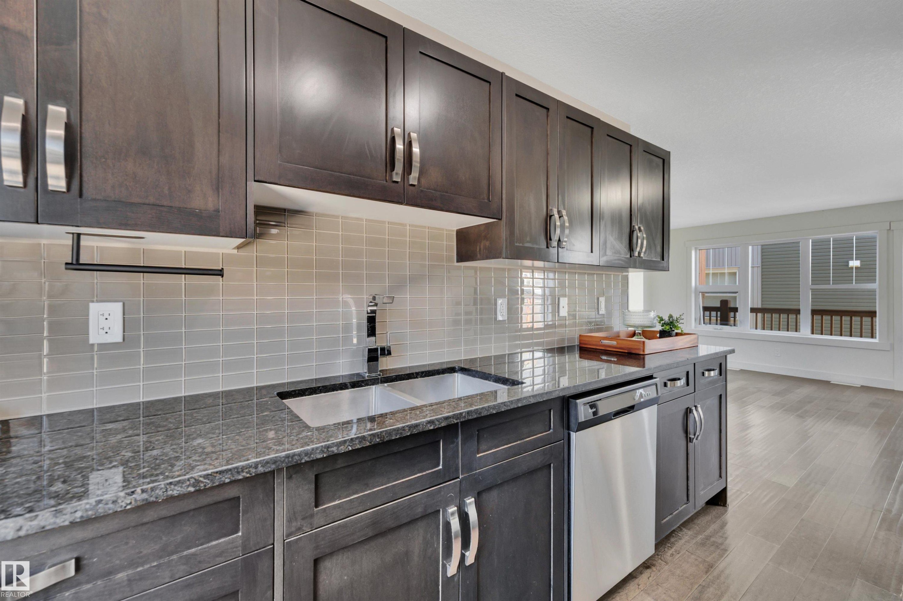 #296 401 Southfork Dr, Leduc, AB - Indoor Photo Showing Kitchen With Stainless Steel Kitchen With Double Sink With Upgraded Kitchen
