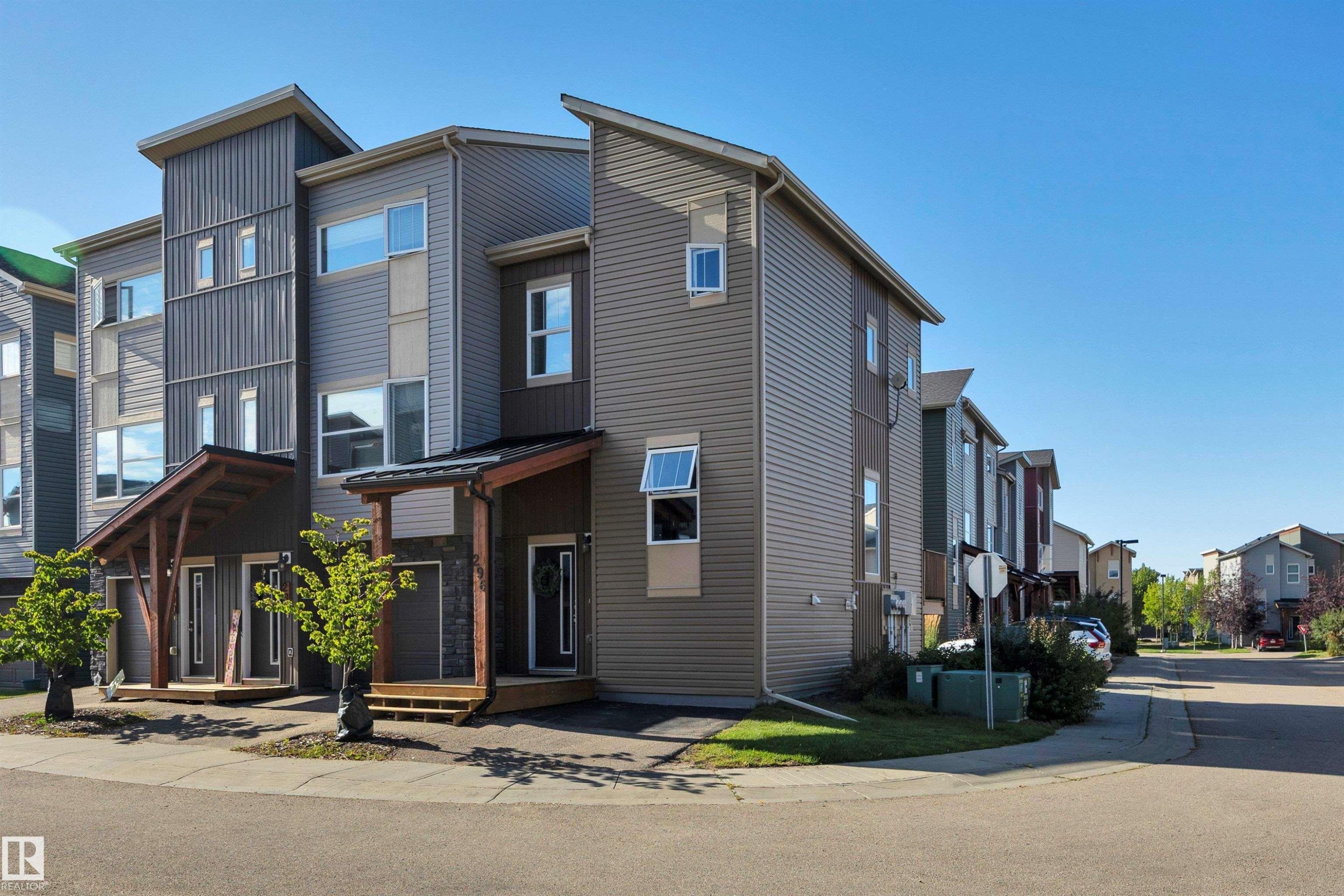 #296 401 Southfork Dr, Leduc, AB - Outdoor With Facade