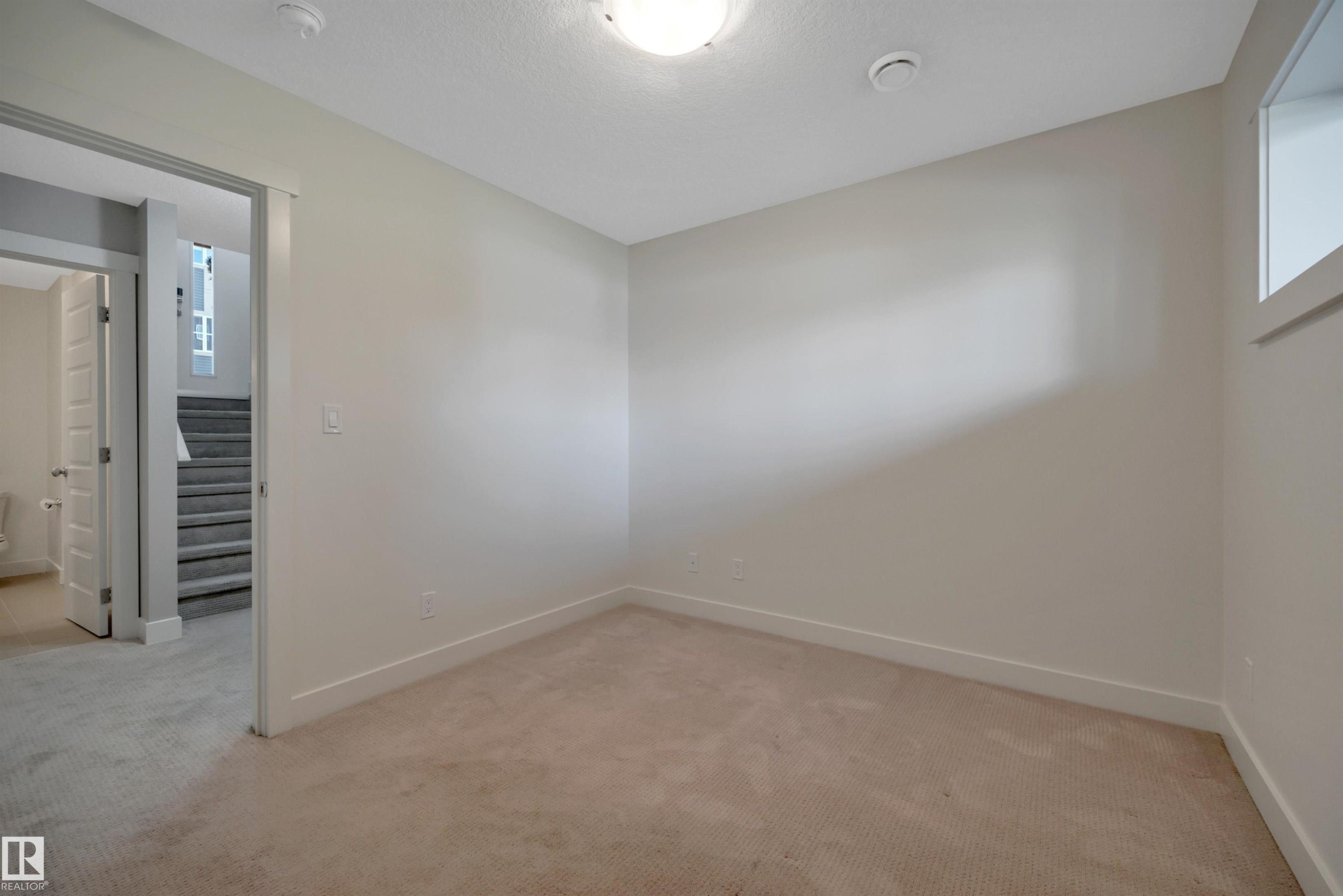 #296 401 Southfork Dr, Leduc, AB - Indoor Photo Showing Other Room