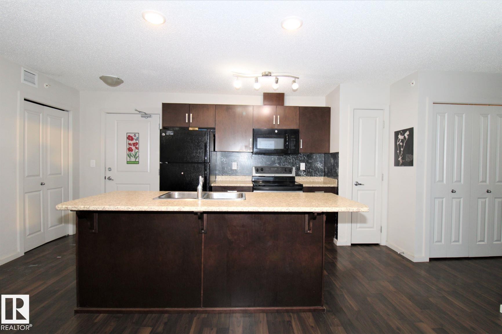 #430 5515 7 Av Sw, Edmonton, AB - Indoor Photo Showing Kitchen With Double Sink
