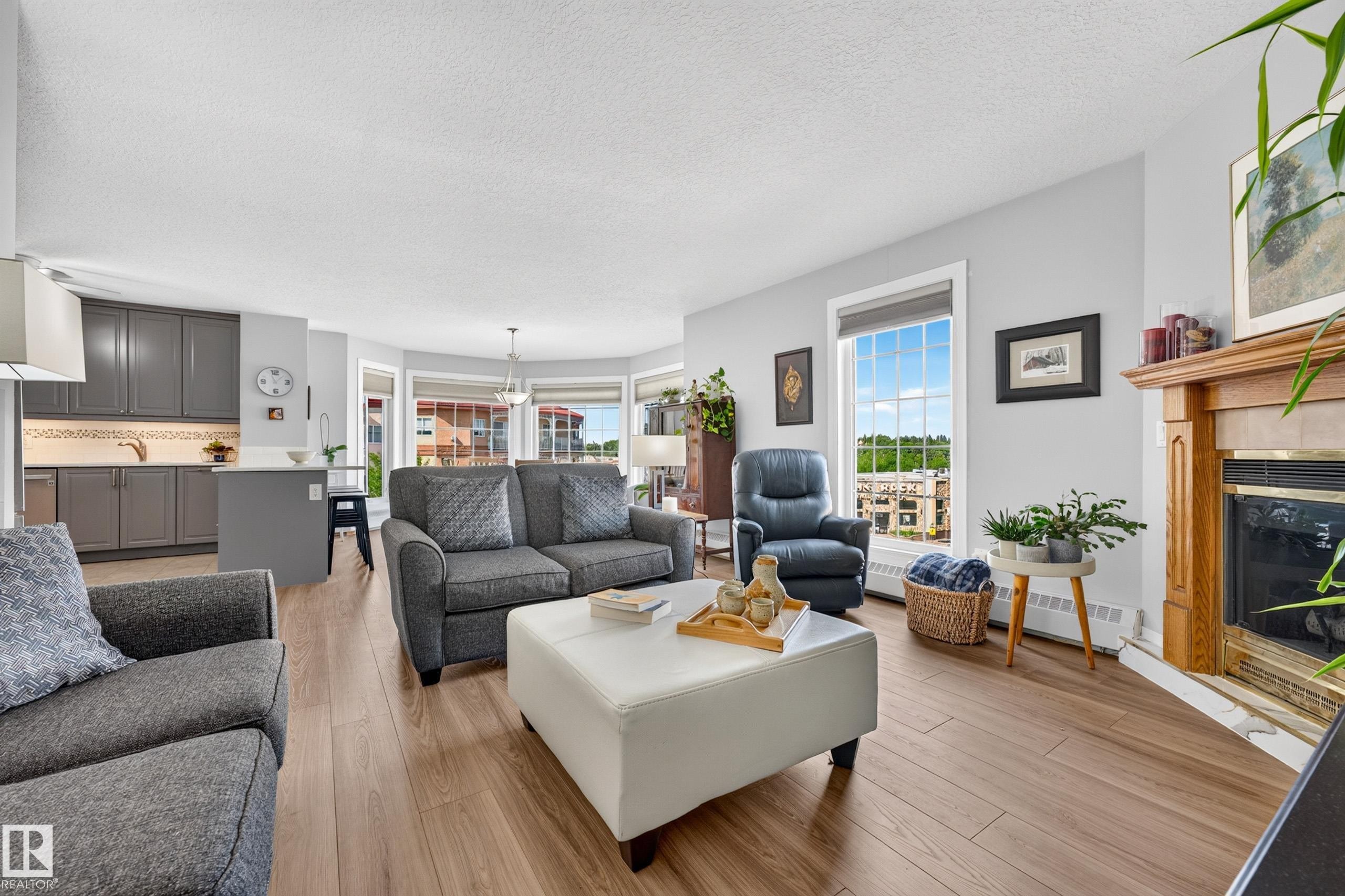 #405 3 Perron St, St. Albert, AB - Indoor Photo Showing Living Room With Fireplace