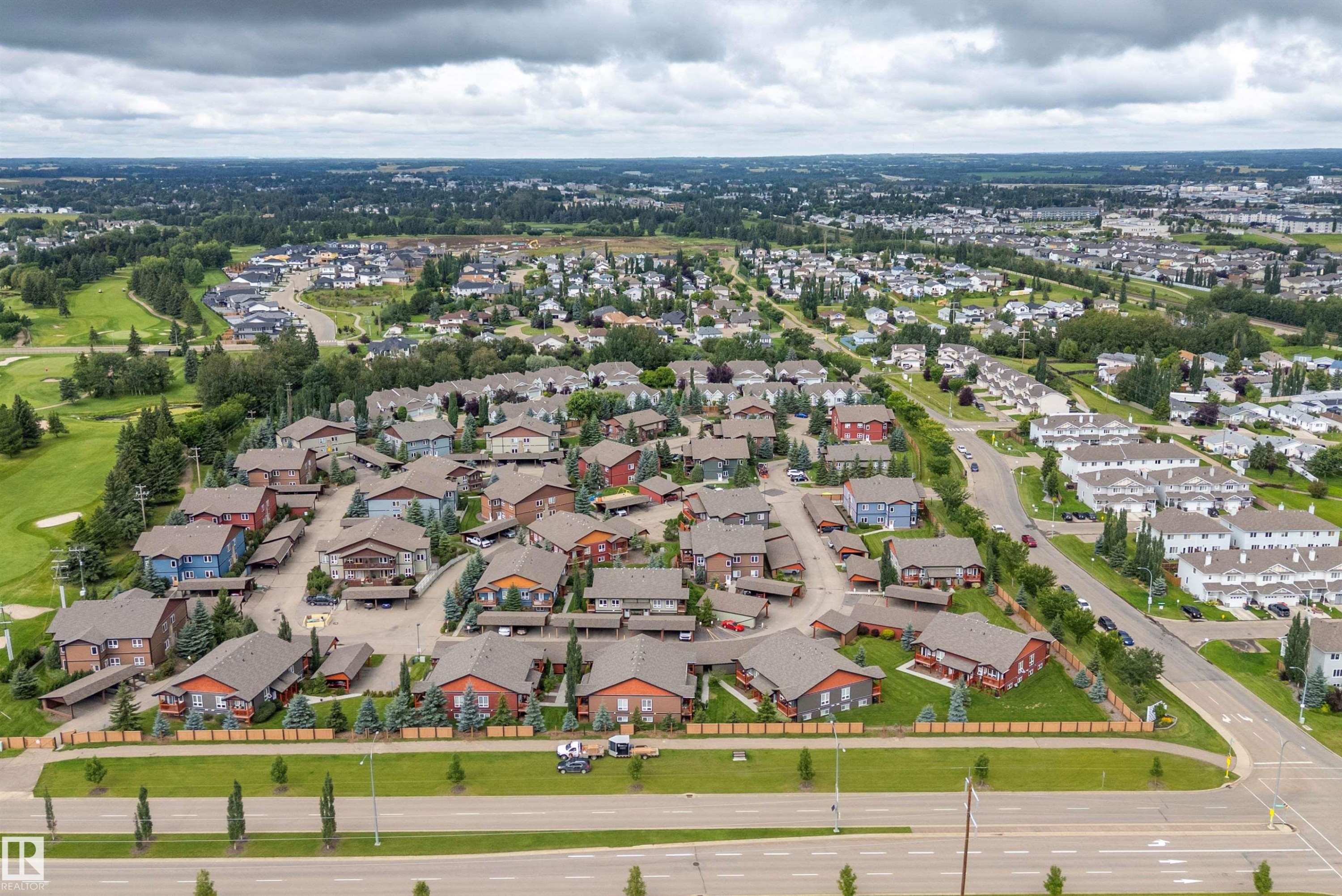 Residential community featuring varied architectural styles and mature landscaping - 203 Graybriar Green, Stony Plain, AB - Outdoor With View