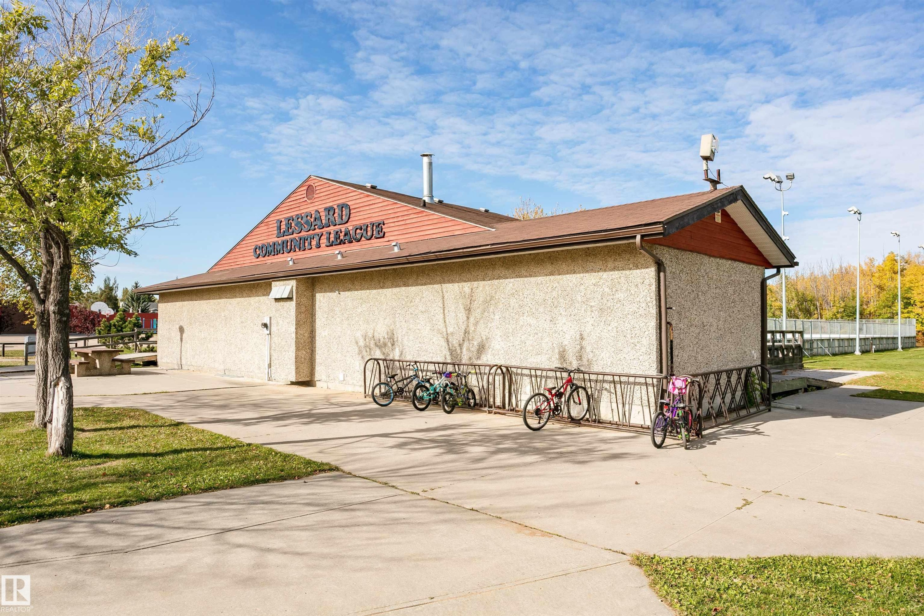 Concrete exterior with a prominent gabled roofline - 6016 177 Street Nw, Edmonton, AB - Outdoor