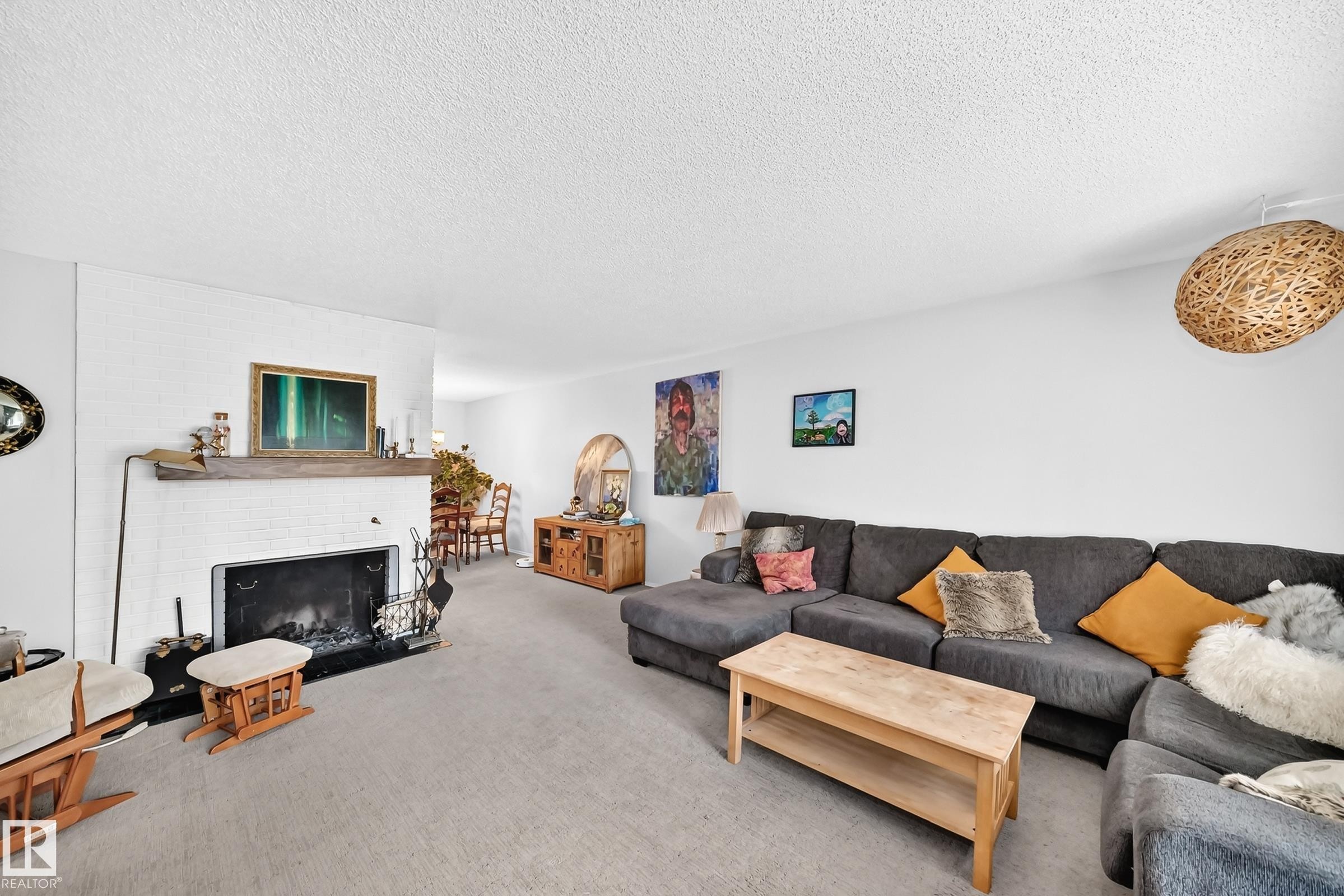 3516 117A Street Nw, Edmonton, AB - Indoor Photo Showing Living Room With Fireplace