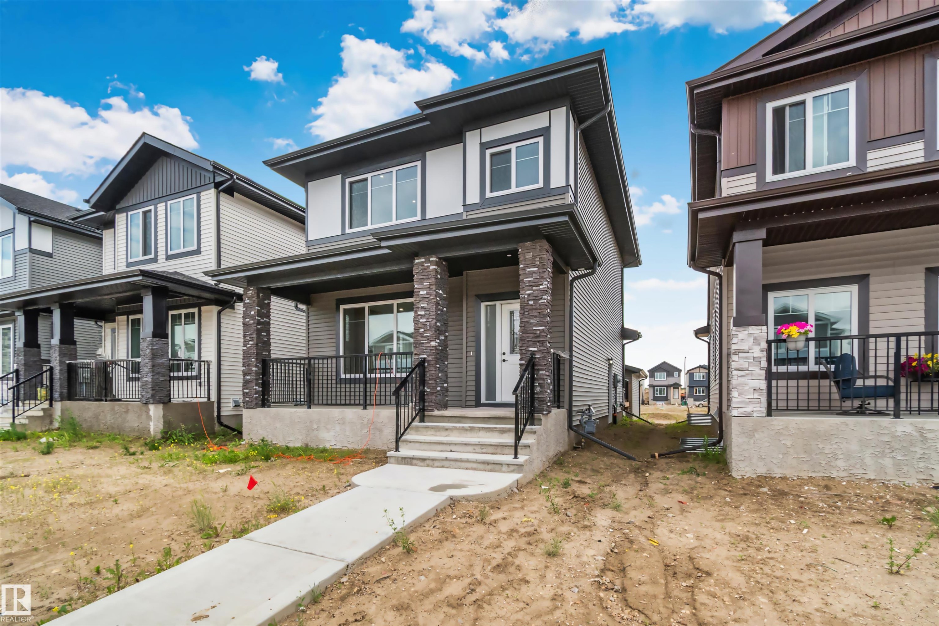 324 Roberts Wynd, Leduc, AB - Outdoor With Deck Patio Veranda With Facade