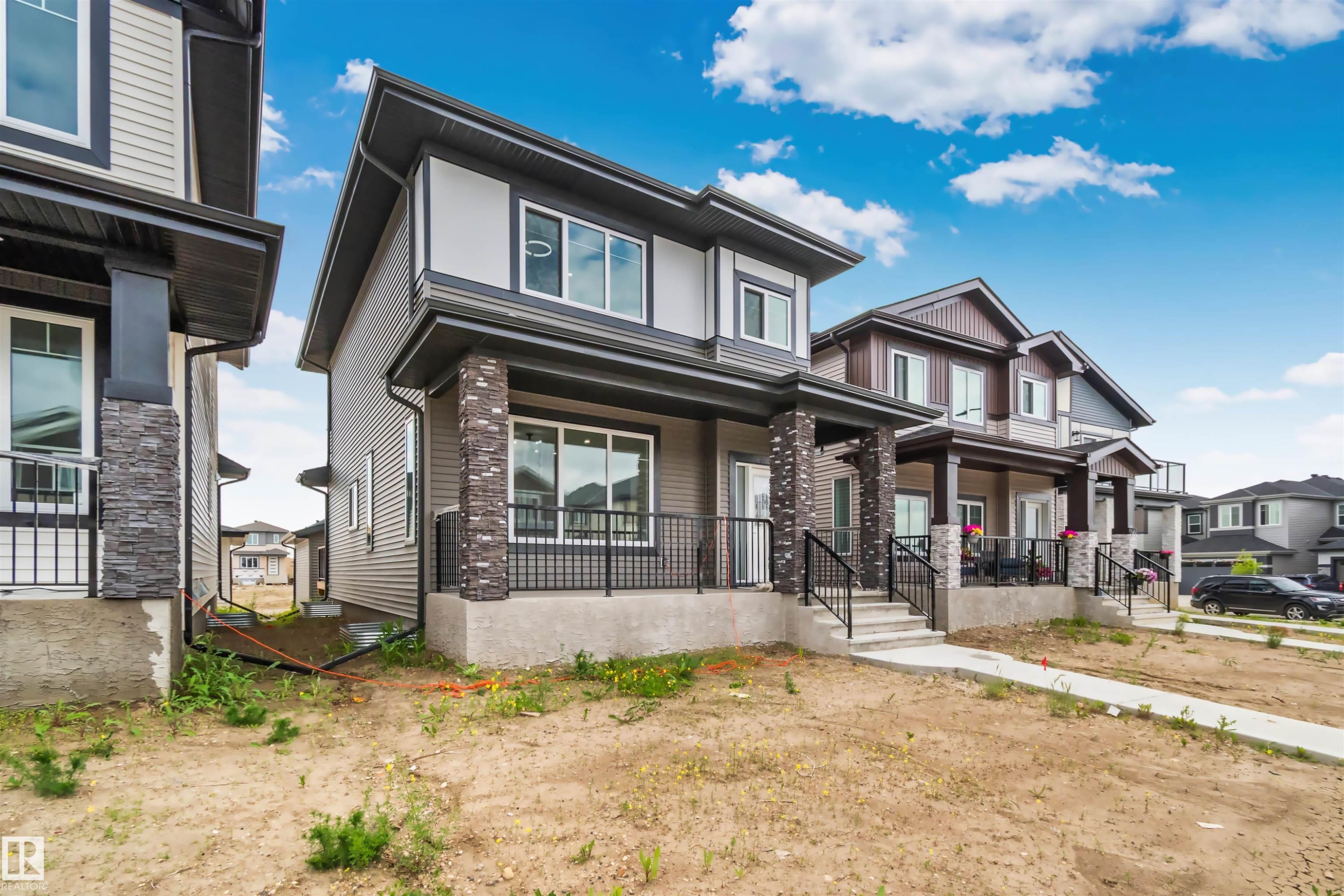 324 Roberts Wynd, Leduc, AB - Outdoor With Deck Patio Veranda With Facade