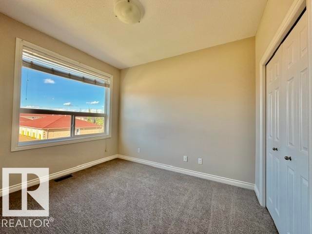 #8 4702 57 Av, Wetaskiwin, AB - Indoor Photo Showing Other Room