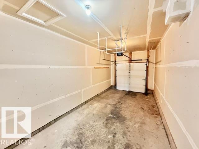 #8 4702 57 Av, Wetaskiwin, AB - Indoor Photo Showing Garage