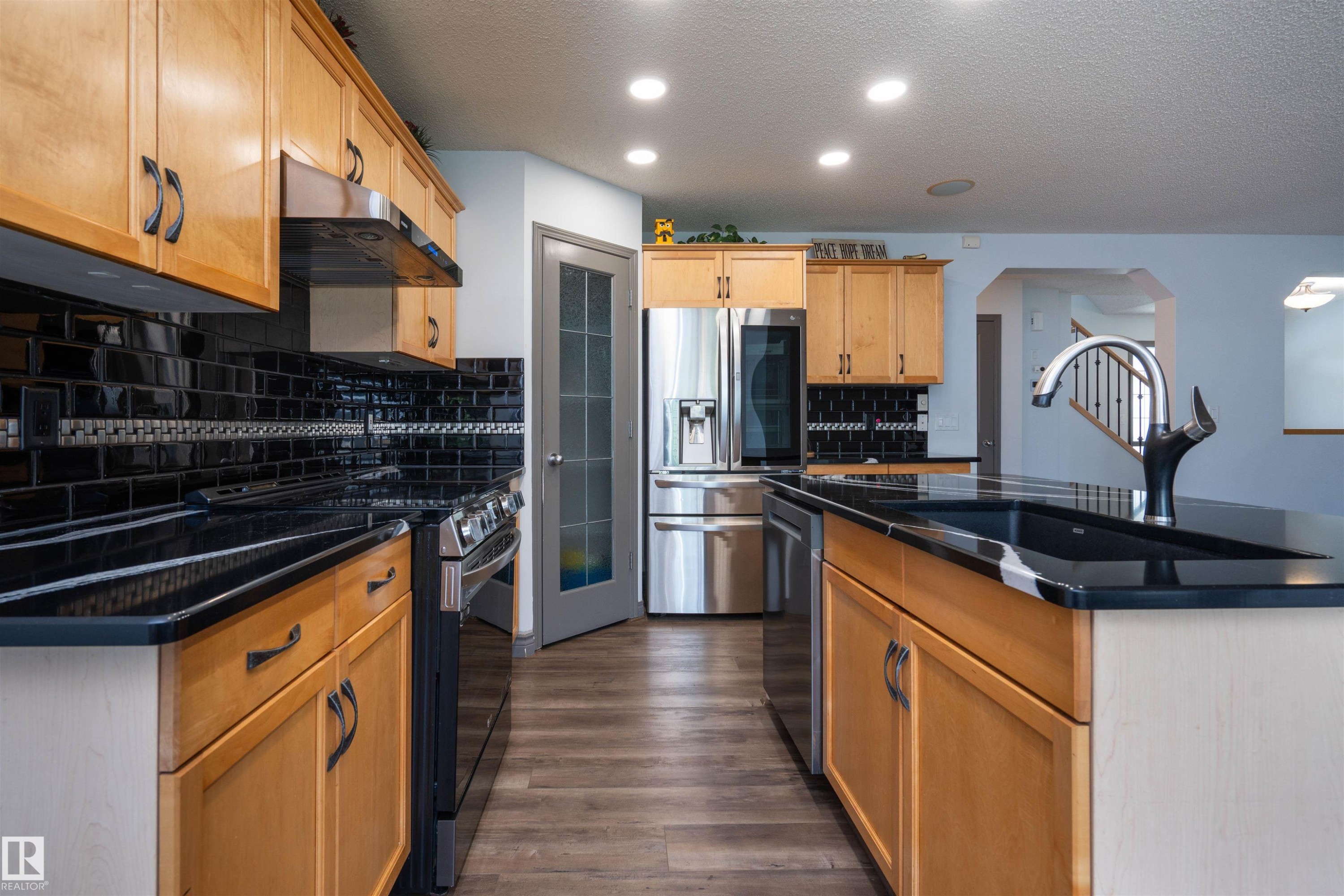 16820 57 Street Nw, Edmonton, AB - Indoor Photo Showing Kitchen With Double Sink