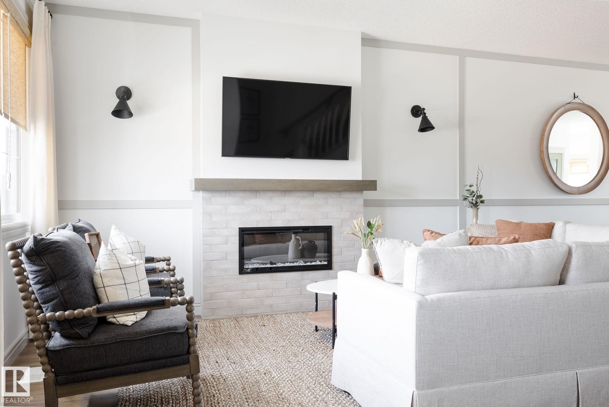 21204 25 Avenue Nw, Edmonton, AB - Indoor Photo Showing Living Room With Fireplace