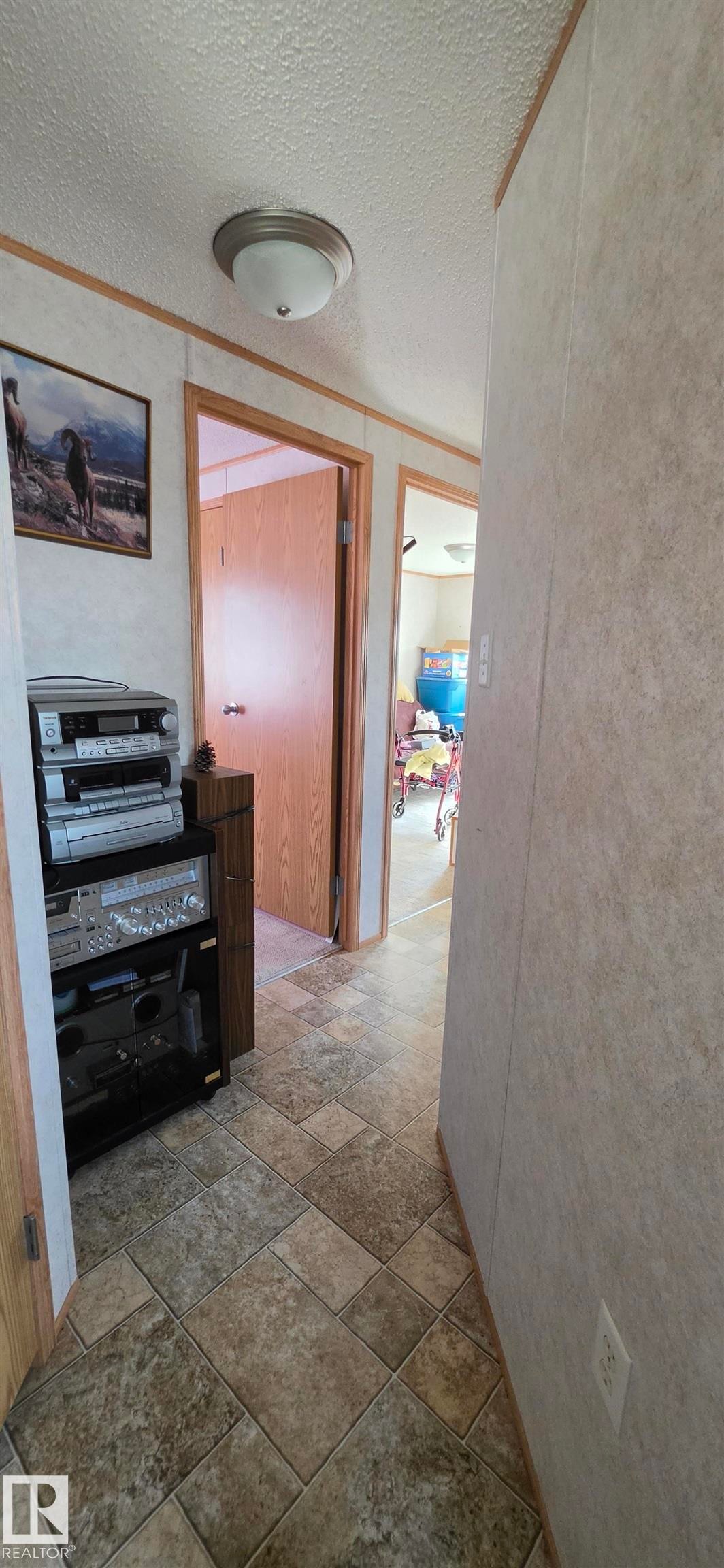 Additional content - #56 4202 45 St, Wetaskiwin, AB - Indoor Photo Showing Other Room