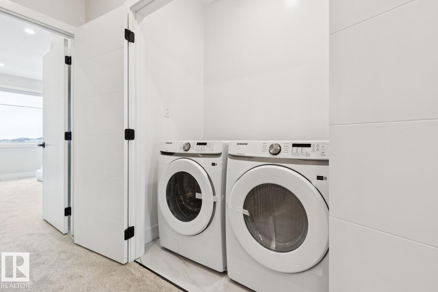 490 Robinson Boulevard, Leduc, AB - Indoor Photo Showing Laundry Room