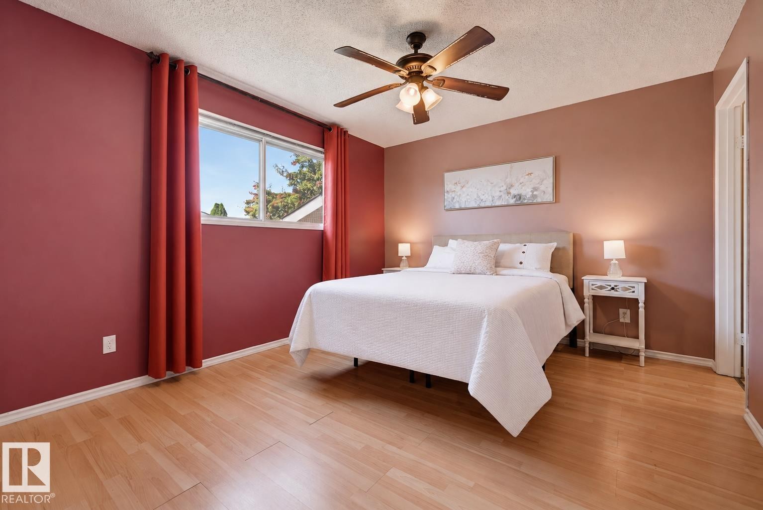 Wood-finish flooring - 6768 39 Avenue Nw, Edmonton, AB - Indoor Photo Showing Bedroom