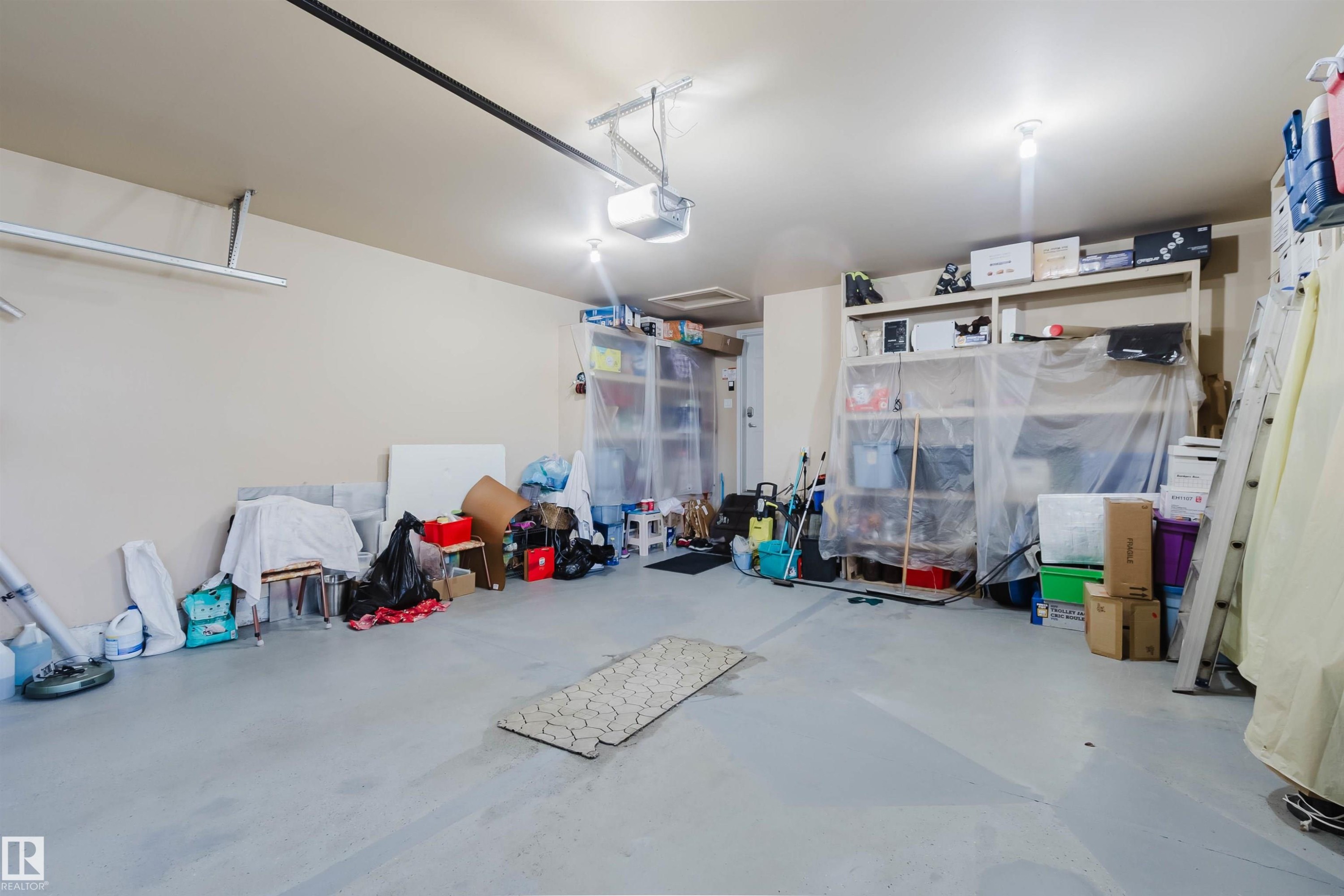 6604 Sandin Cove Nw, Edmonton, AB - Indoor Photo Showing Garage