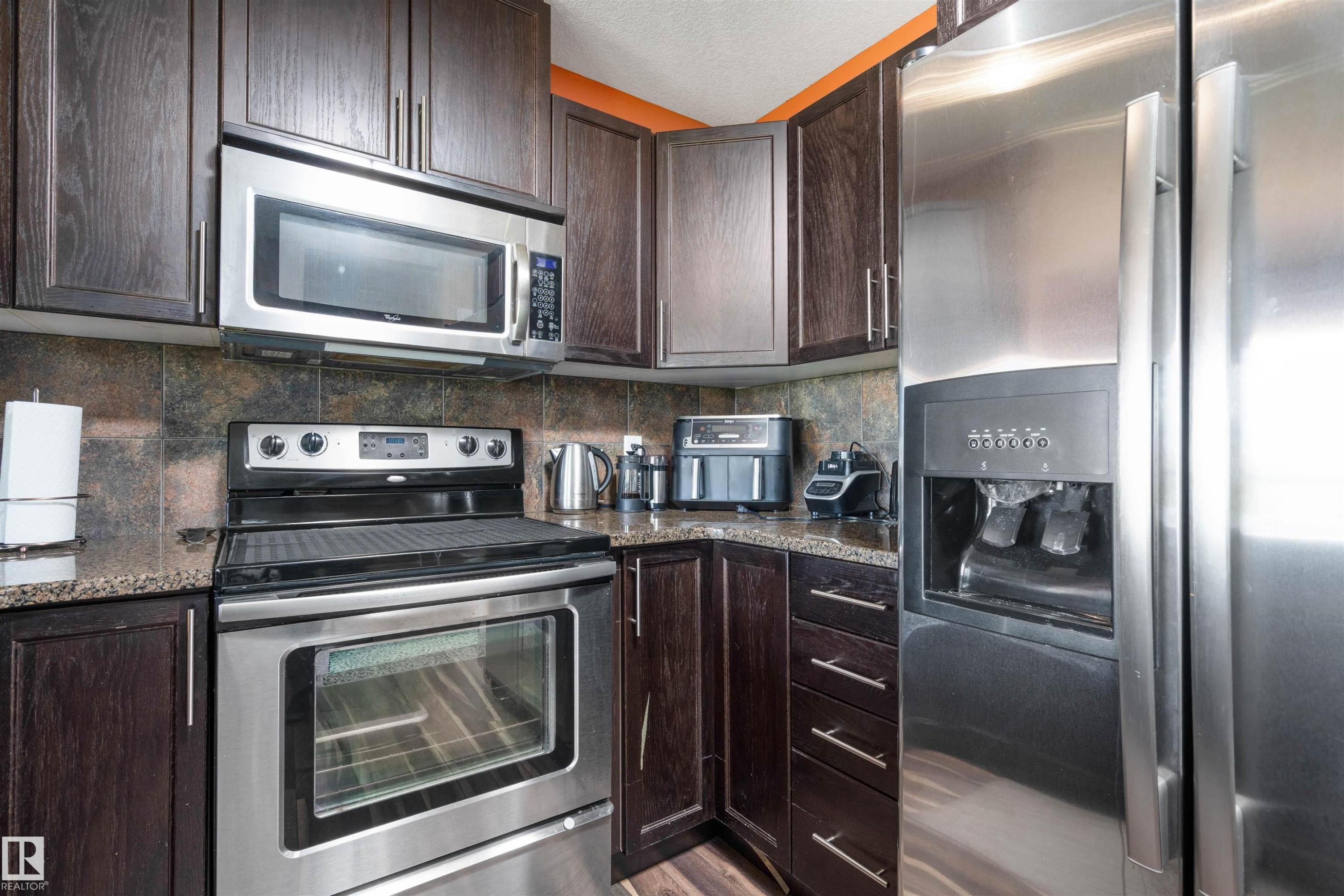 #146 5420 Grant Macewan Bv, Leduc, AB - Indoor Photo Showing Kitchen With Stainless Steel Kitchen