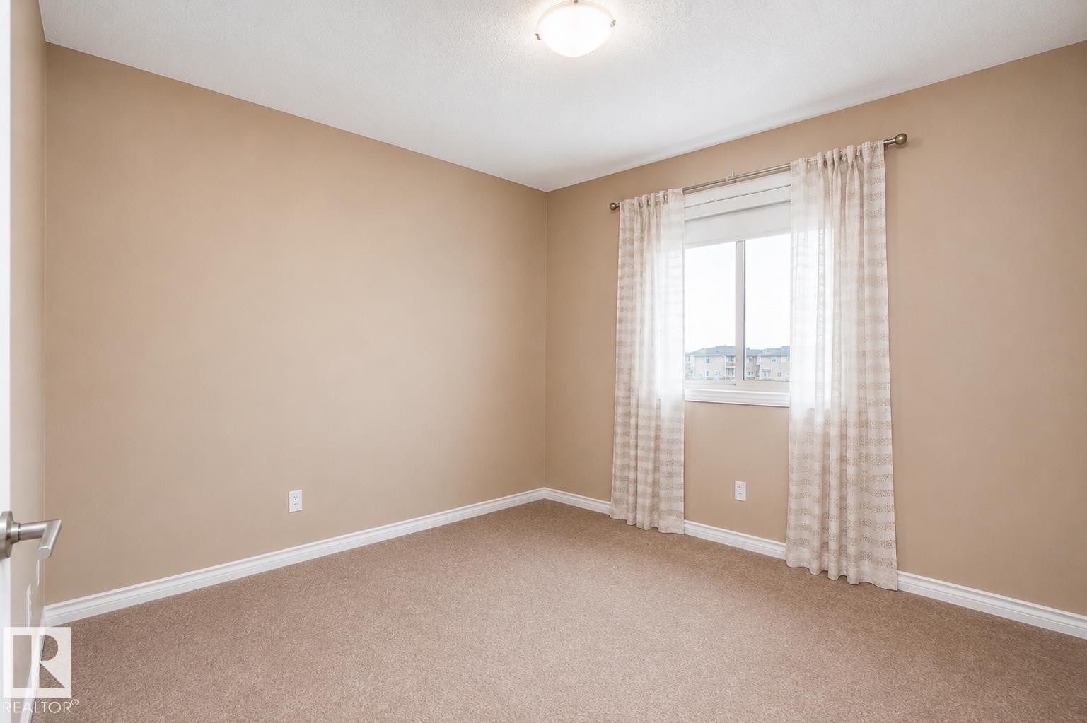#146 5420 Grant Macewan Bv, Leduc, AB - Indoor Photo Showing Other Room