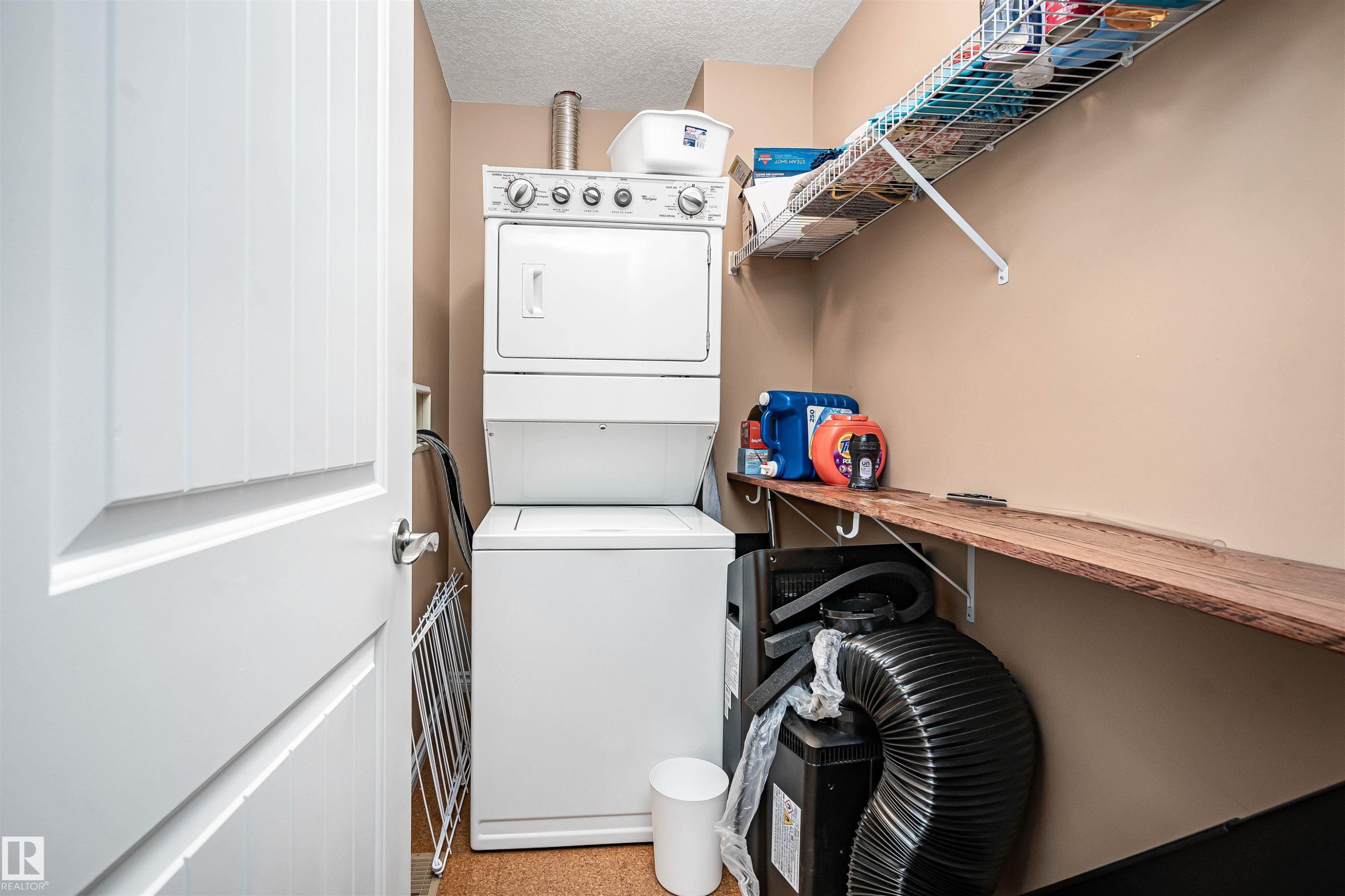 #146 5420 Grant Macewan Bv, Leduc, AB - Indoor Photo Showing Laundry Room
