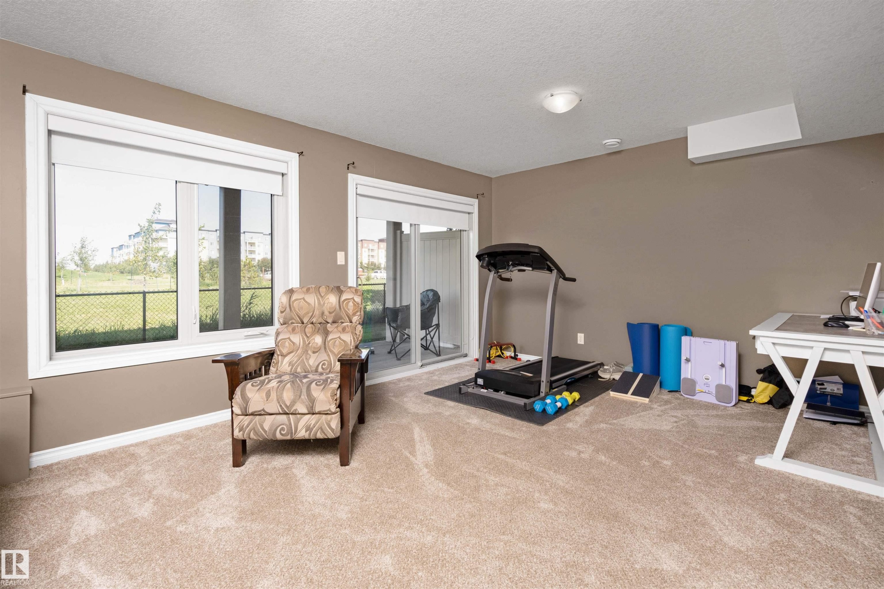 #146 5420 Grant Macewan Bv, Leduc, AB - Indoor Photo Showing Gym Room