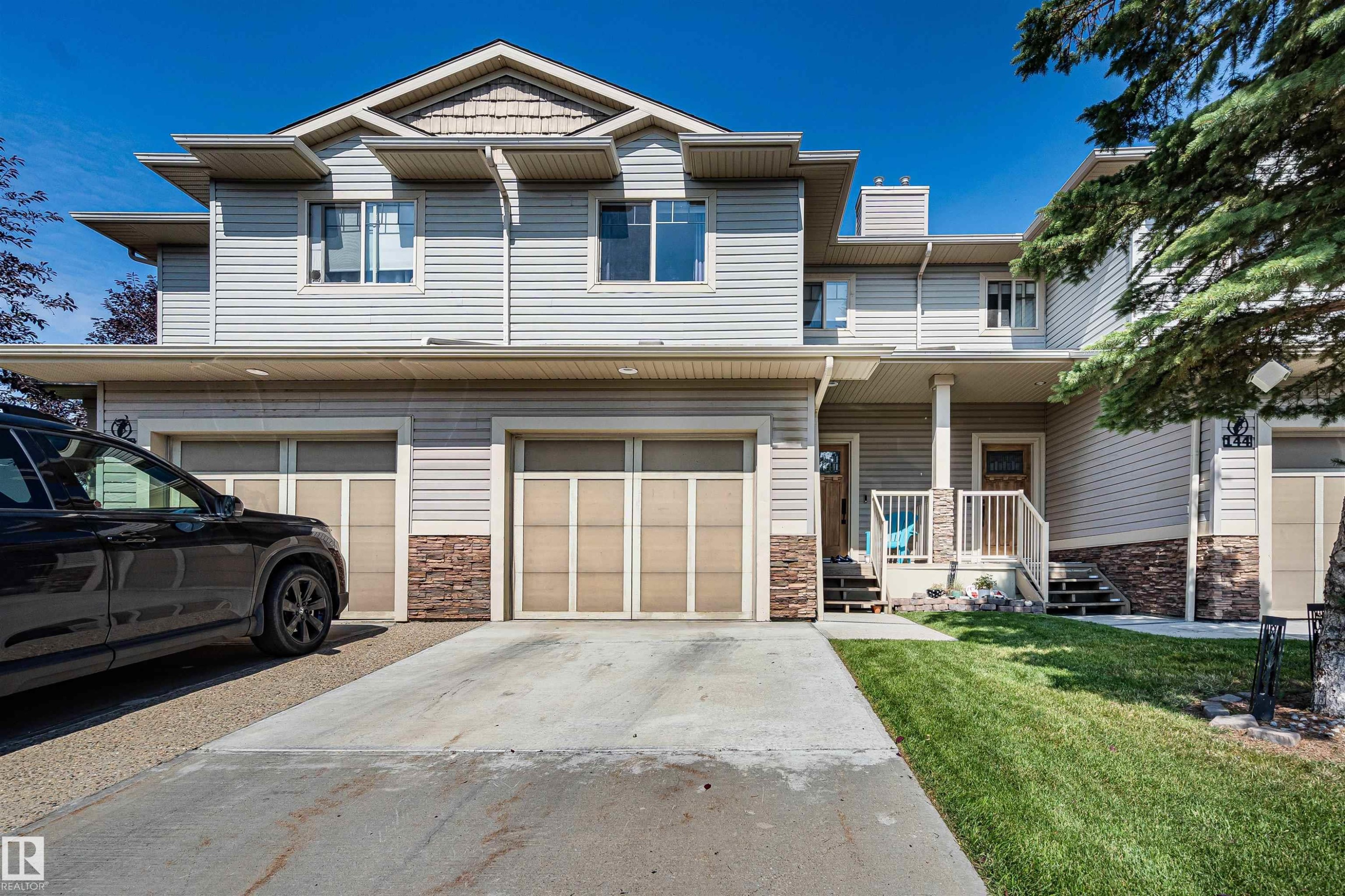 #146 5420 Grant Macewan Bv, Leduc, AB - Outdoor With Facade