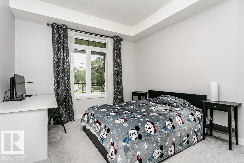 #209 10811 72 Av Nw, Edmonton, AB - Indoor Photo Showing Bedroom