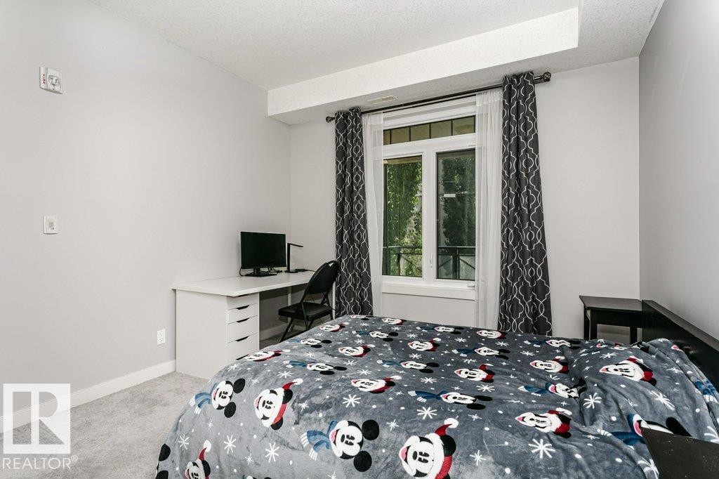 #209 10811 72 Av Nw, Edmonton, AB - Indoor Photo Showing Bedroom