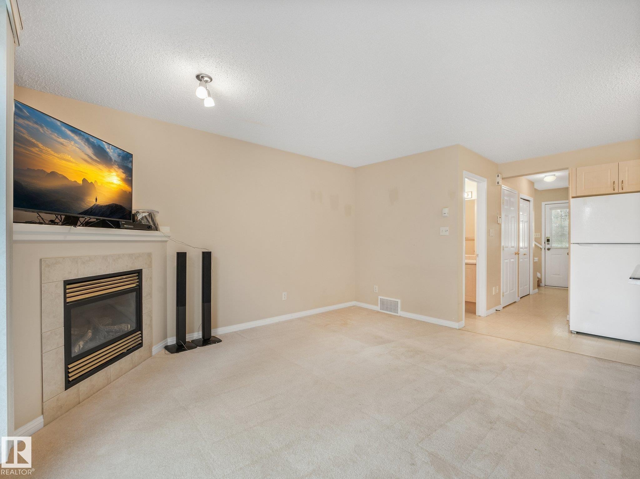 1142 Barnes Way Sw, Edmonton, AB - Indoor With Fireplace