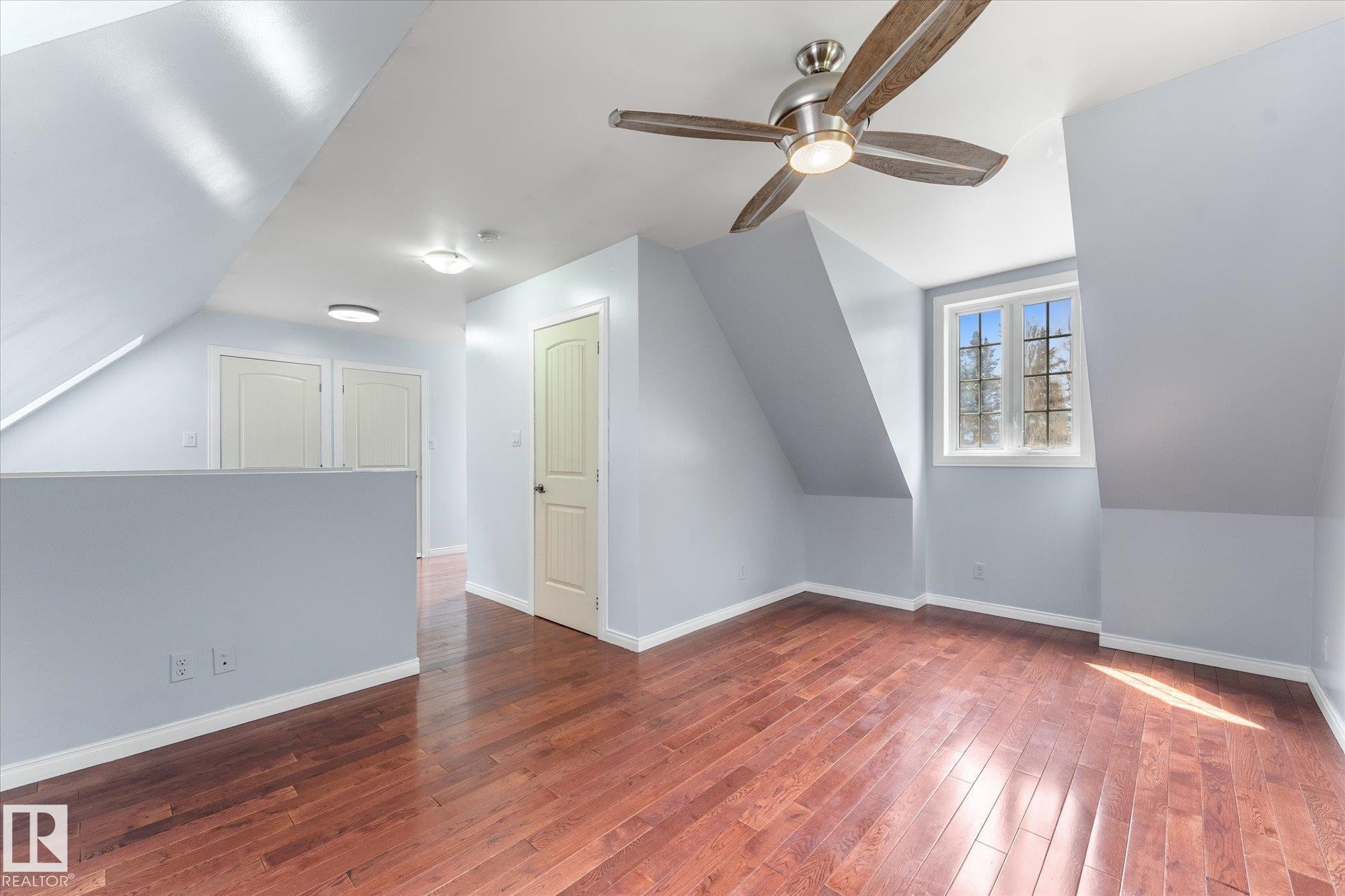 large upper level- arrange it to suit your needs on floor plan as a primary suite but some would consider it to be great space for 2 beds especially with a 2 piece bath no need to have to go down stairs - 2, 59031 Range Rd 232, Rural Thorhild County, AB - Indoor Photo Showing Other Room