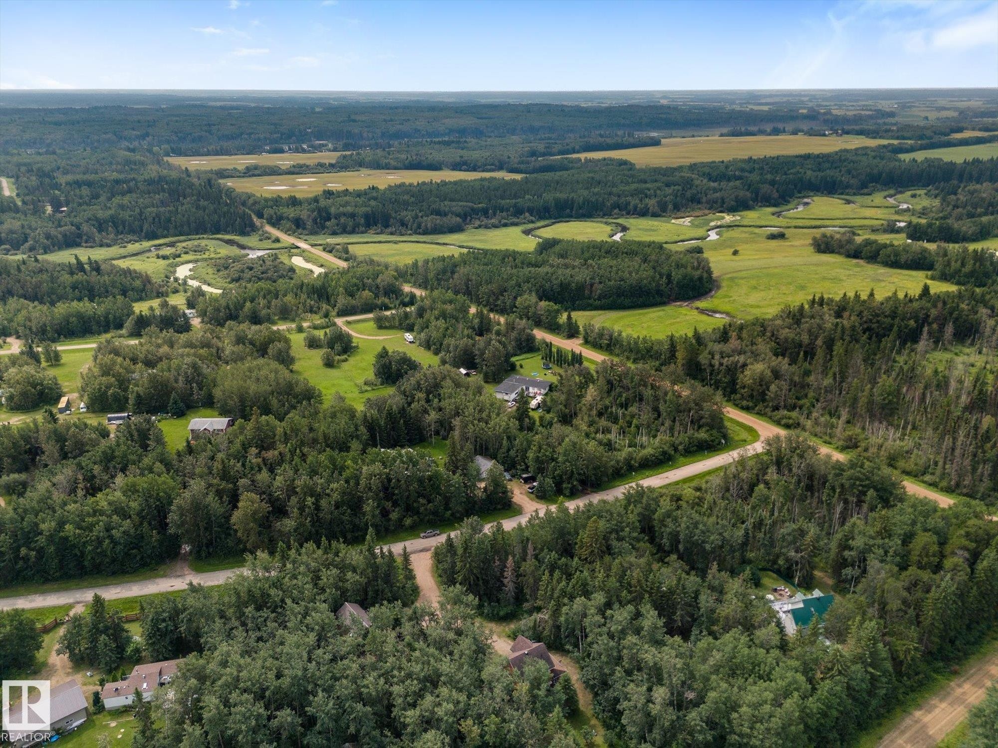 Expansive wooded property featuring a meandering river and open fields - 2, 59031 Range Rd 232, Rural Thorhild County, AB - Outdoor With View