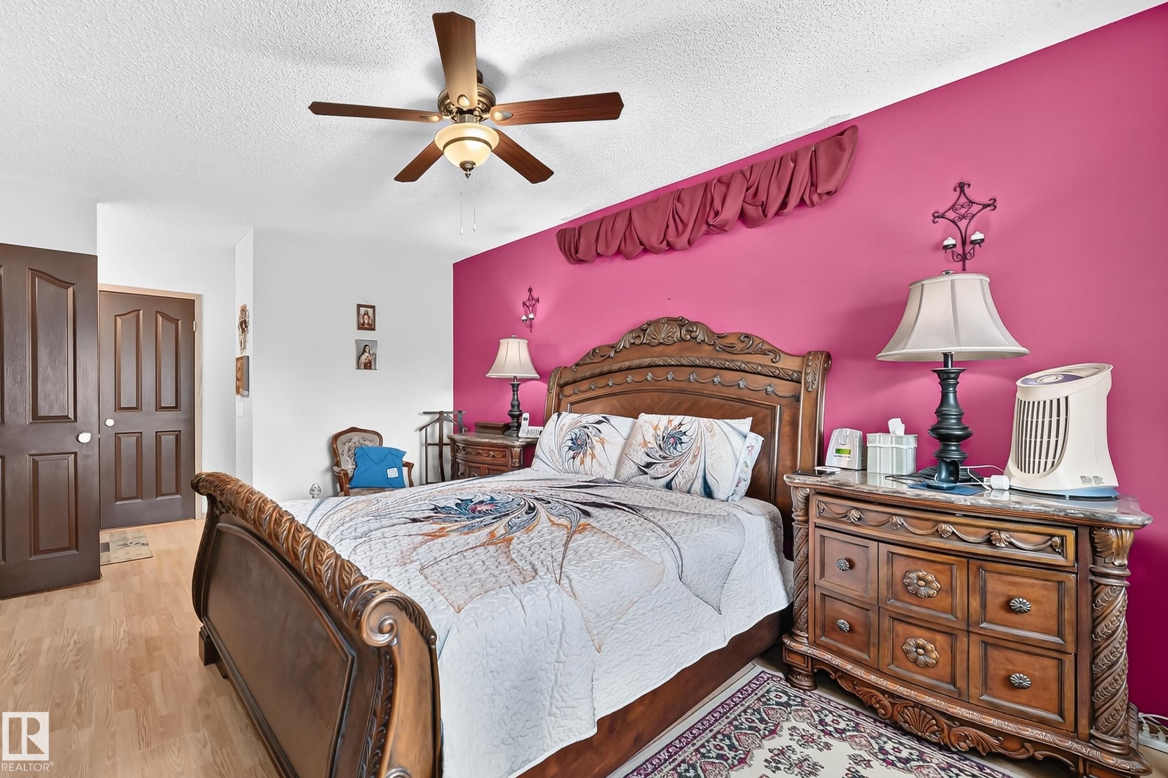 Recessed lighting, wood-finish flooring, ceiling fan, and solid panel doors - 13069 37 Street Nw, Edmonton, AB - Indoor Photo Showing Bedroom