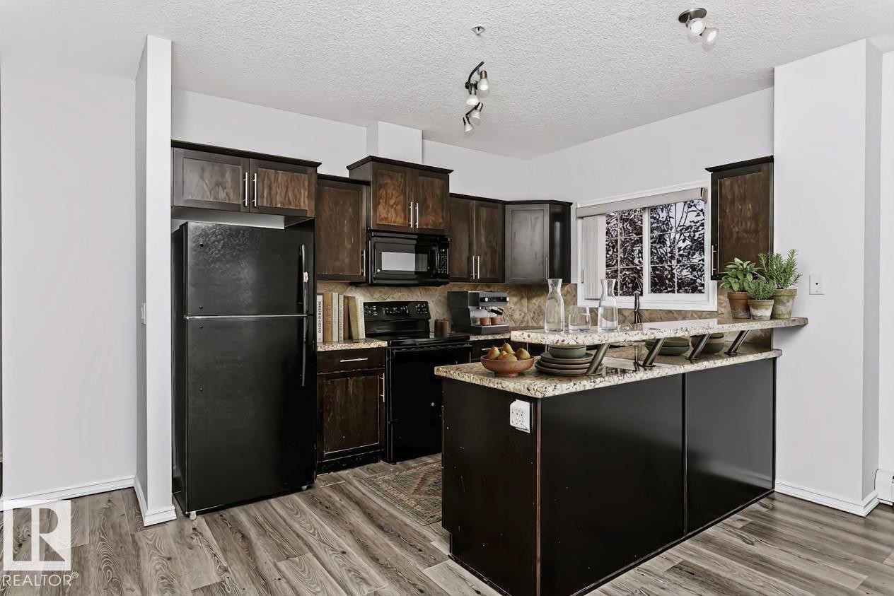 #341 263 Macewan Rd Sw, Edmonton, AB - Indoor Photo Showing Kitchen