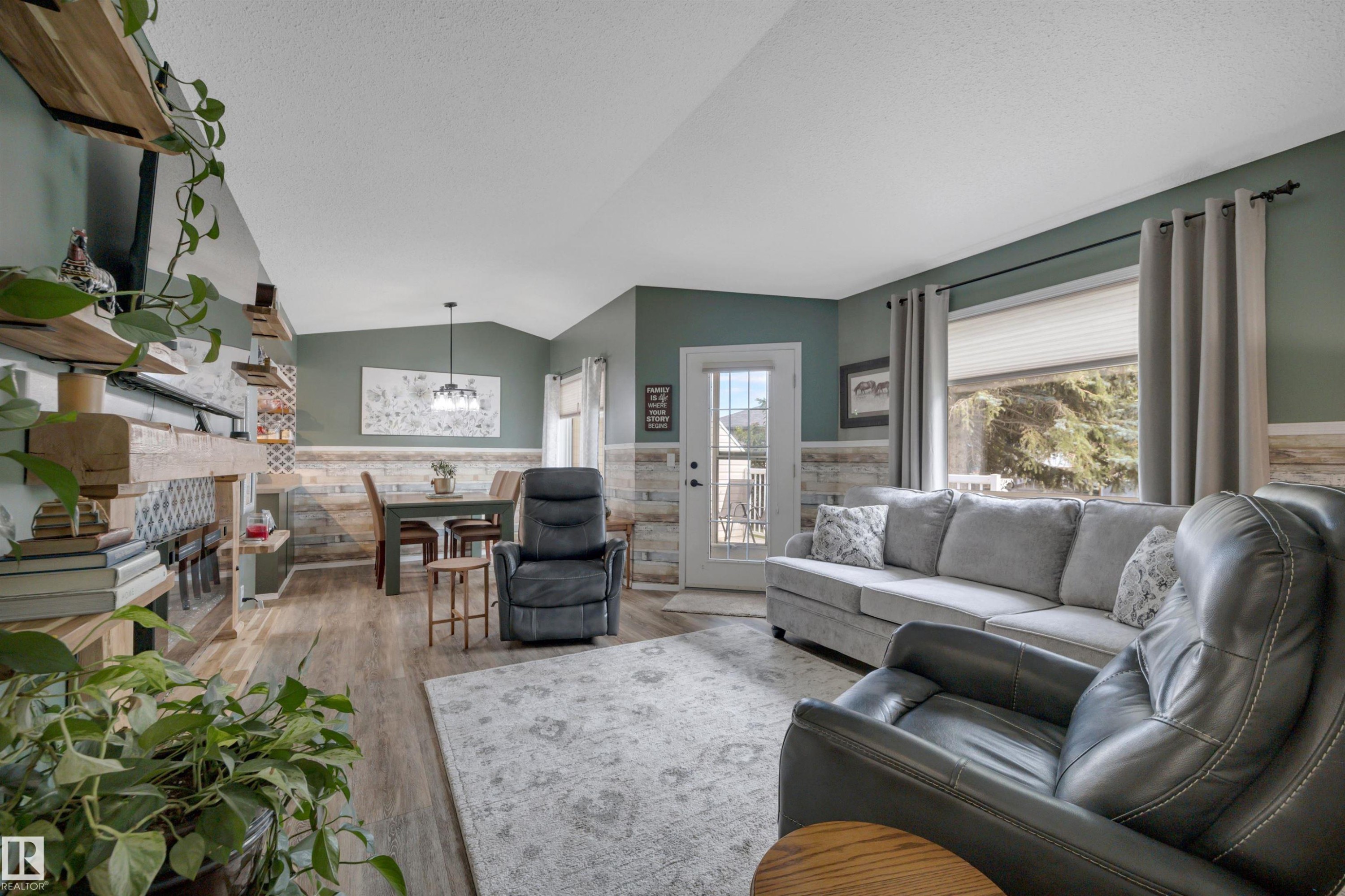 #62 4410 52 Ave, Wetaskiwin, AB - Indoor Photo Showing Living Room With Fireplace