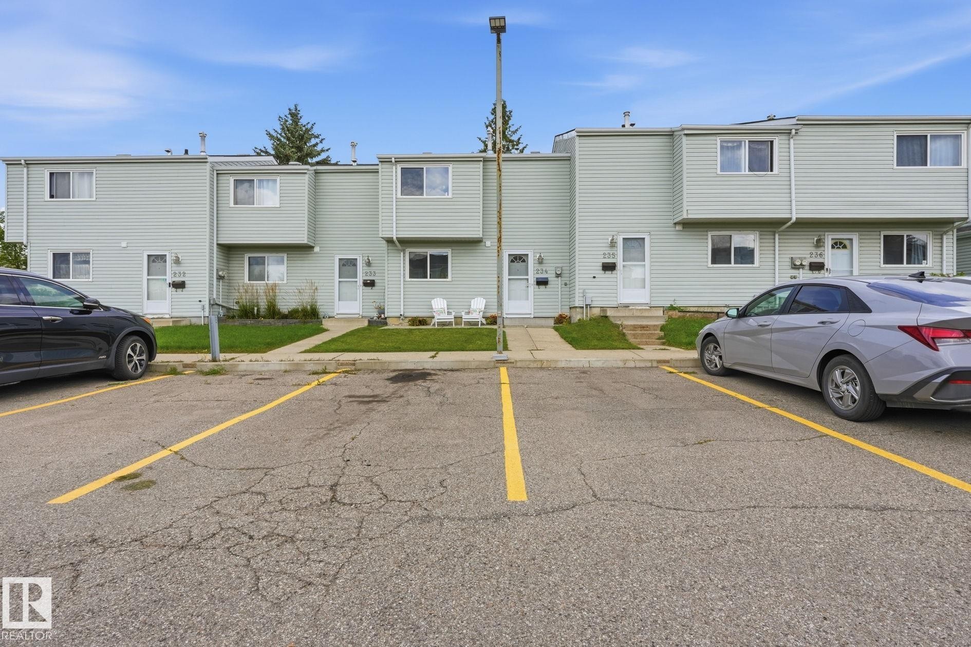 stall left of the lamp post belongs to unit - 234 Dickinsfield Court Nw, Edmonton, AB - Outdoor