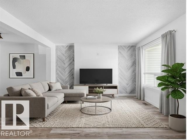 234 Dickinsfield Court Nw, Edmonton, AB - Indoor Photo Showing Living Room