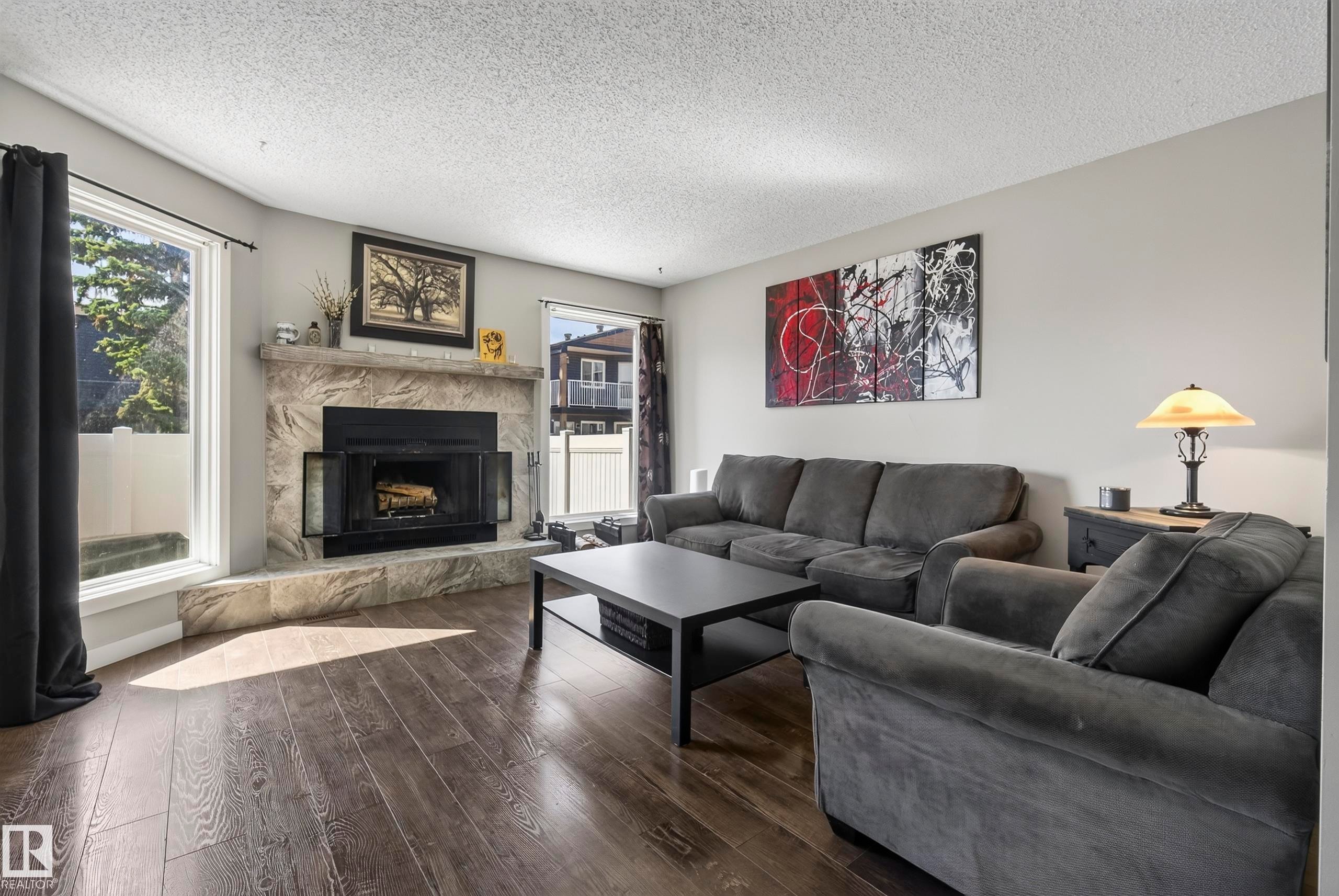 3522 42 Street Nw, Edmonton, AB - Indoor Photo Showing Living Room With Fireplace