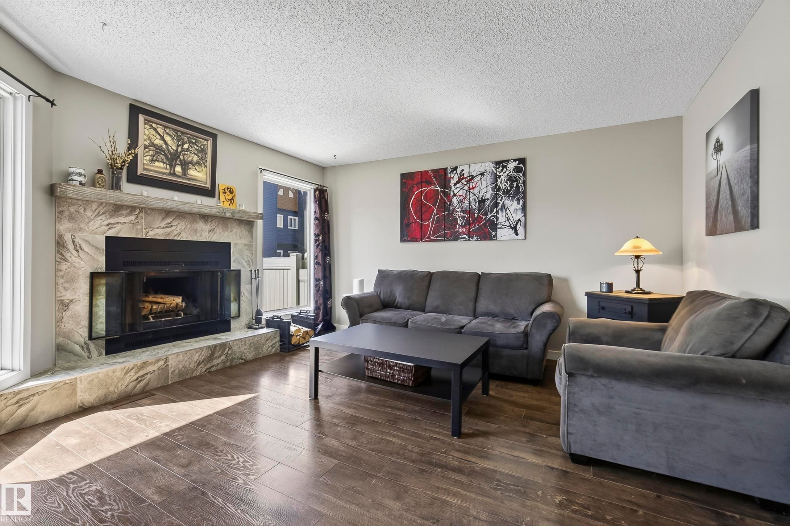 3522 42 Street Nw, Edmonton, AB - Indoor Photo Showing Living Room With Fireplace