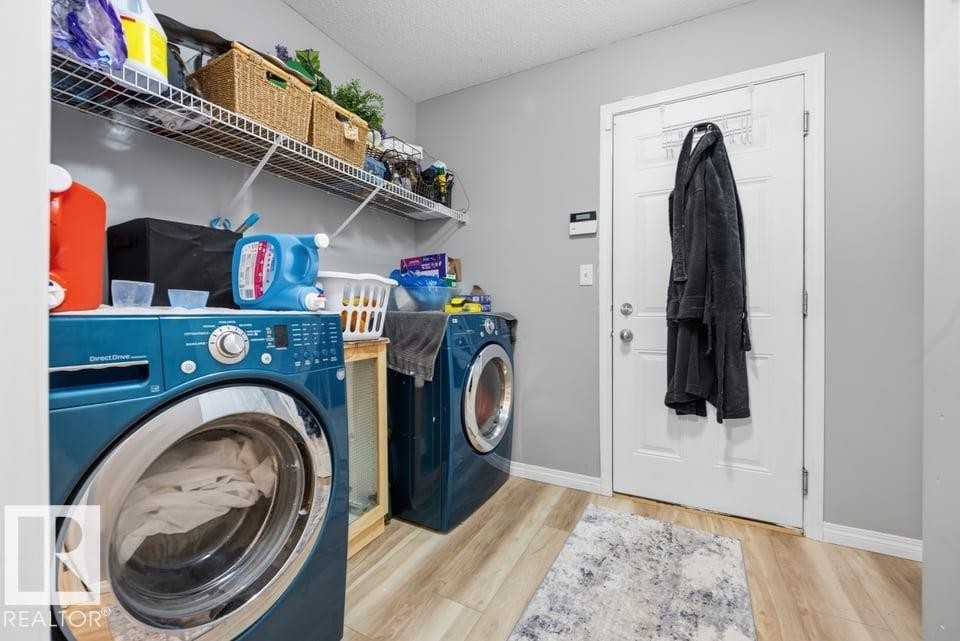 22 Bonin, Beaumont, AB - Indoor Photo Showing Laundry Room