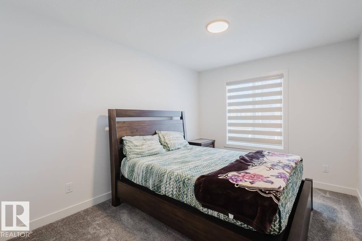 6411 27 Avenue Sw, Edmonton, AB - Indoor Photo Showing Bedroom