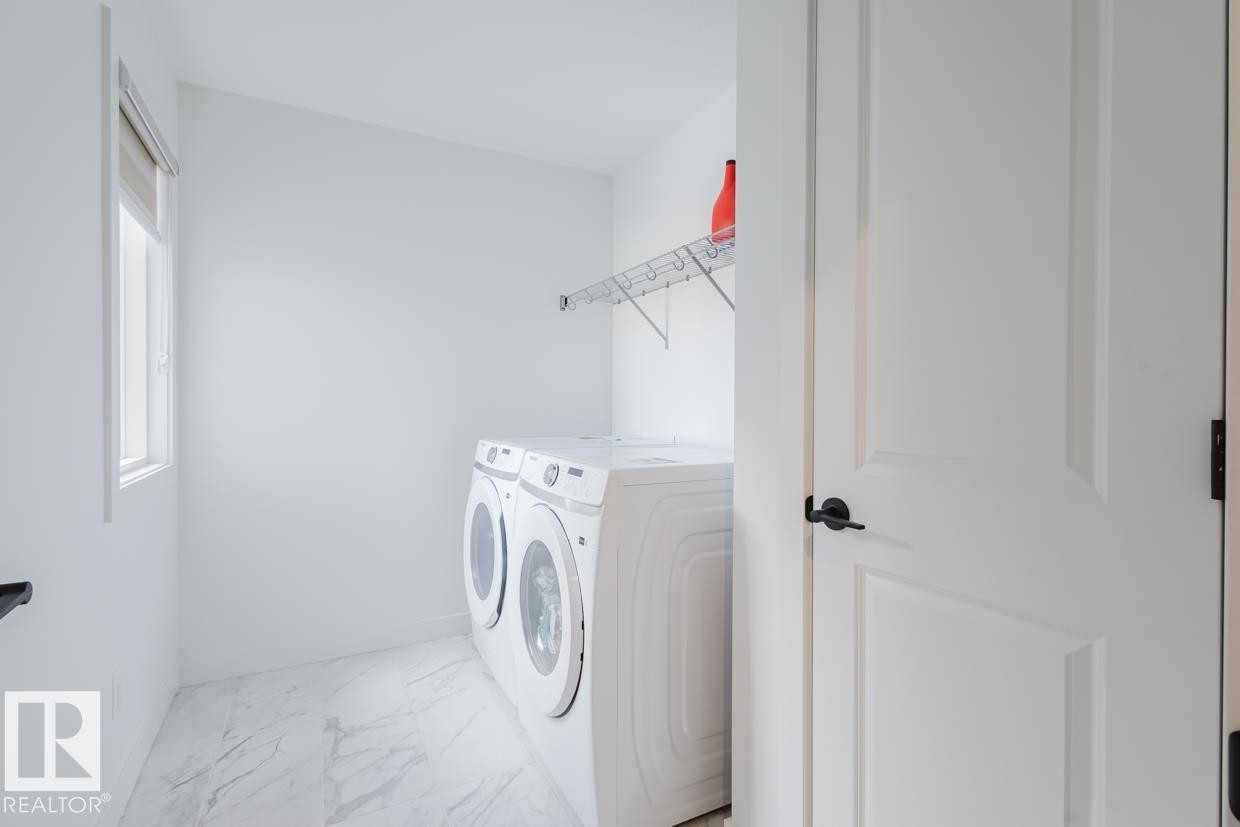 6411 27 Avenue Sw, Edmonton, AB - Indoor Photo Showing Laundry Room