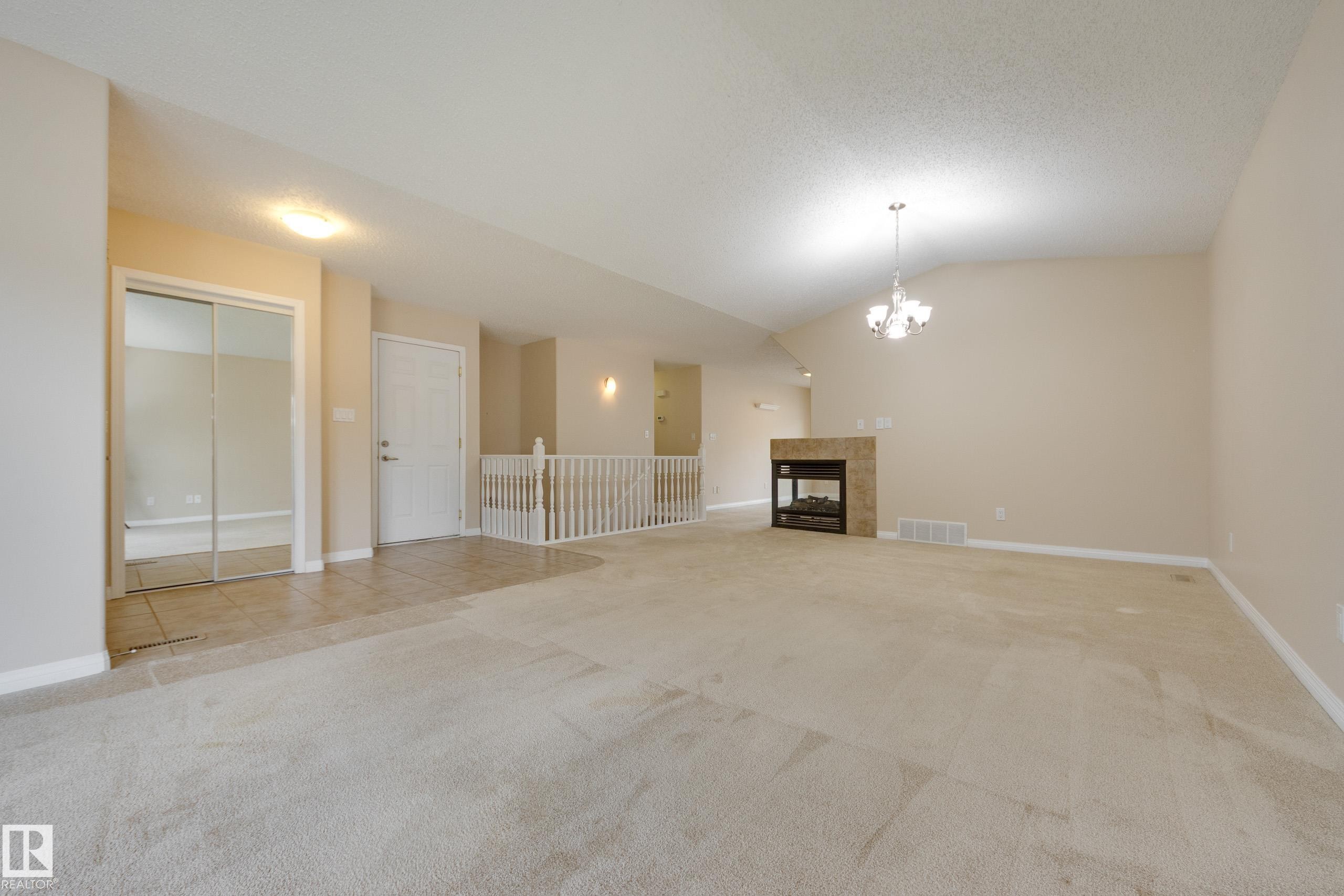 #2 1850 Mill Woods Rd E Nw, Edmonton, AB - Indoor With Fireplace