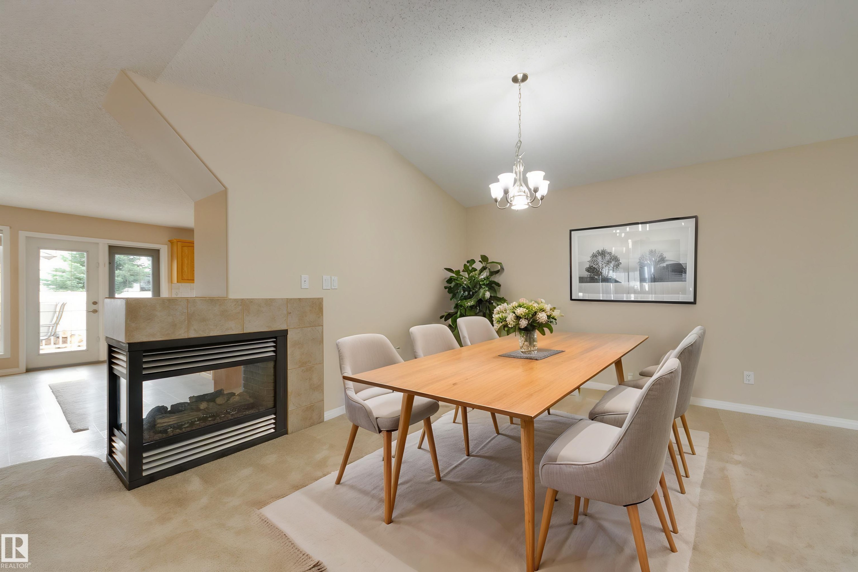 #2 1850 Mill Woods Rd E Nw, Edmonton, AB - Indoor Photo Showing Dining Room With Fireplace