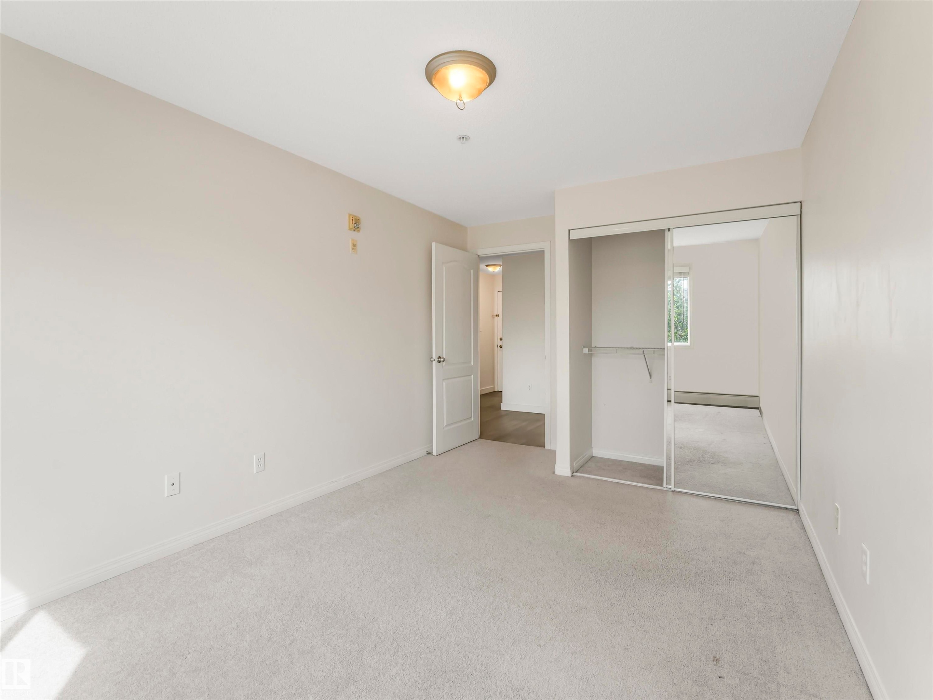 #216 111 Edwards Dr Sw, Edmonton, AB - Indoor Photo Showing Other Room