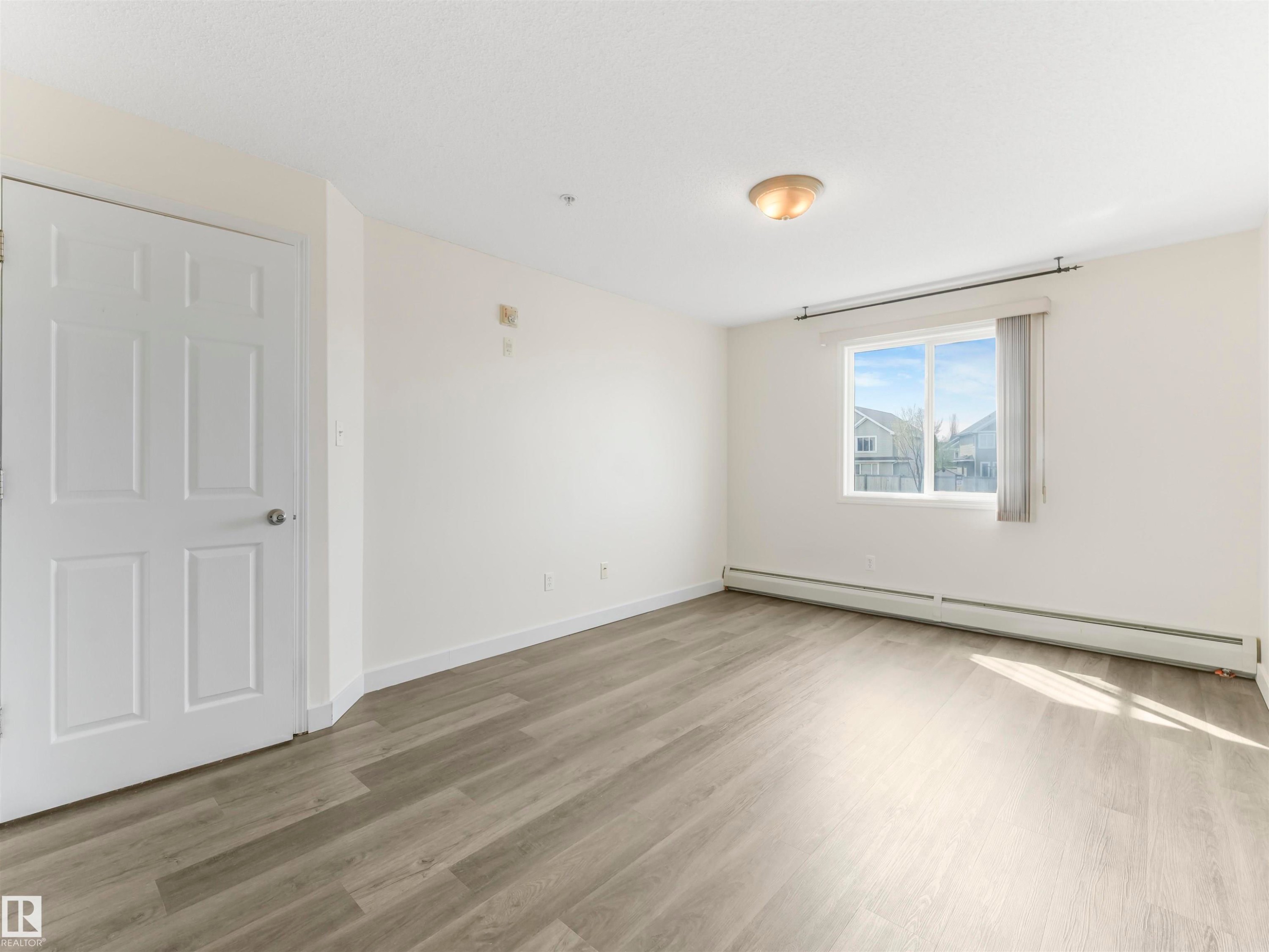 #216 111 Edwards Dr Sw, Edmonton, AB - Indoor Photo Showing Other Room